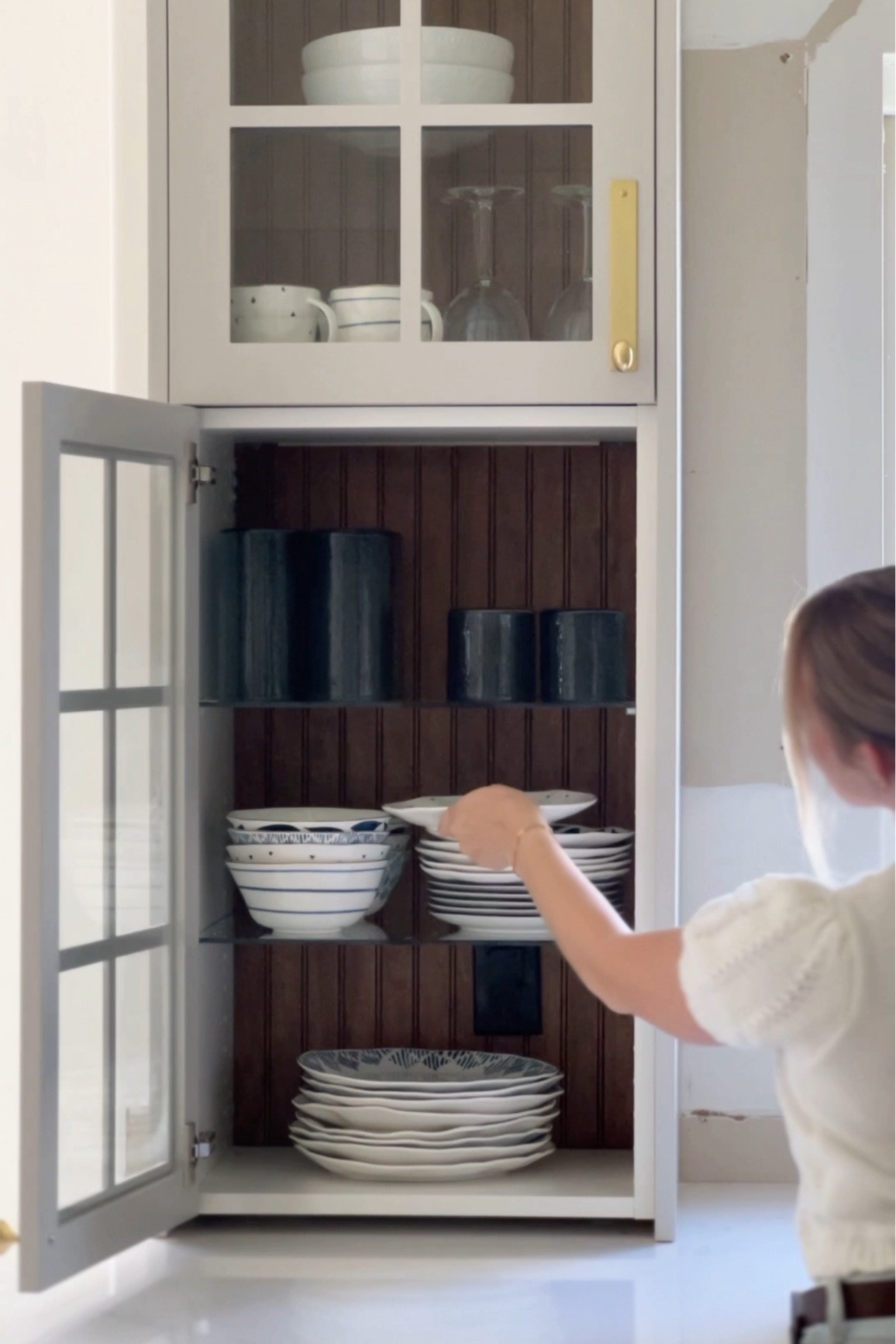 Still so in love with this tower cabinet, especially with the beadboard addition!

#LTKHome