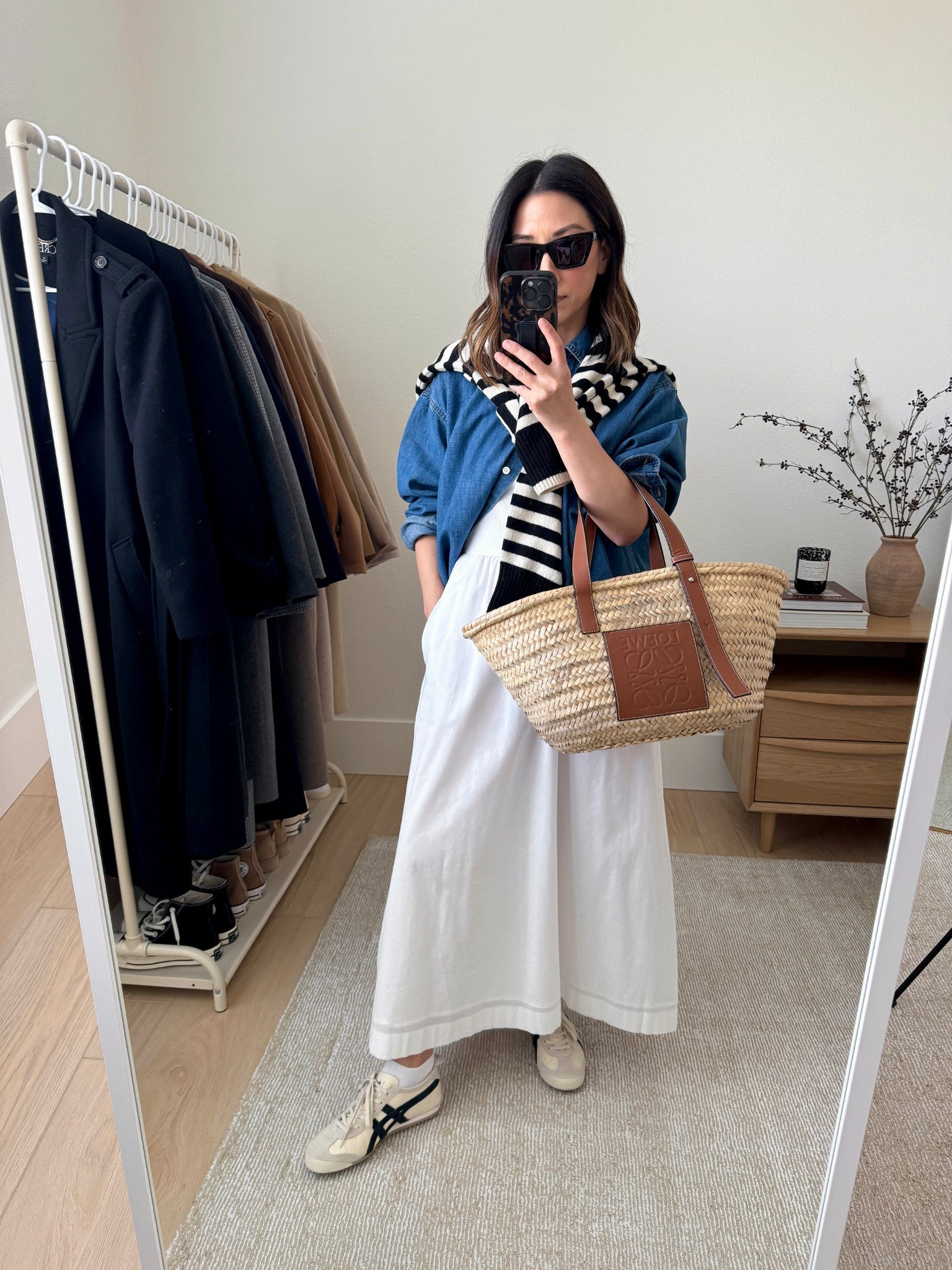 Outfits from my recent European travel capsule. This is for more of spring time, but you can take bits and pieces out if you go in the summer. This dress is old, but I linked a nearly identical option. This style is great for travel because it can be worn many ways. 

On 34th dress xs (old, linked identical)
J.crew denim shirt xs. Has a roomy fit
Onitsuka Tiger sneakers 4 mens. Run big
Loewe tote medium
Everlane sweater xs
YSL Sunglasses

#LTKTravel #LTKPetite