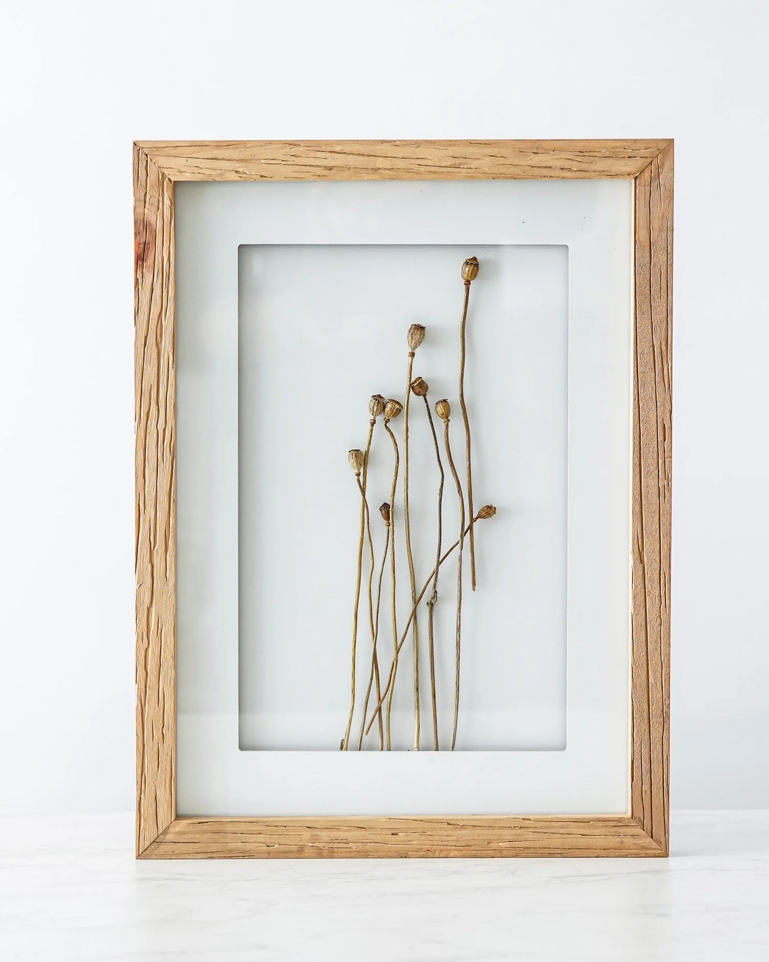 Bring organic texture and understated beauty to your walls with our Wood Framed Dried Floral Wall Art. 

#LTKHome