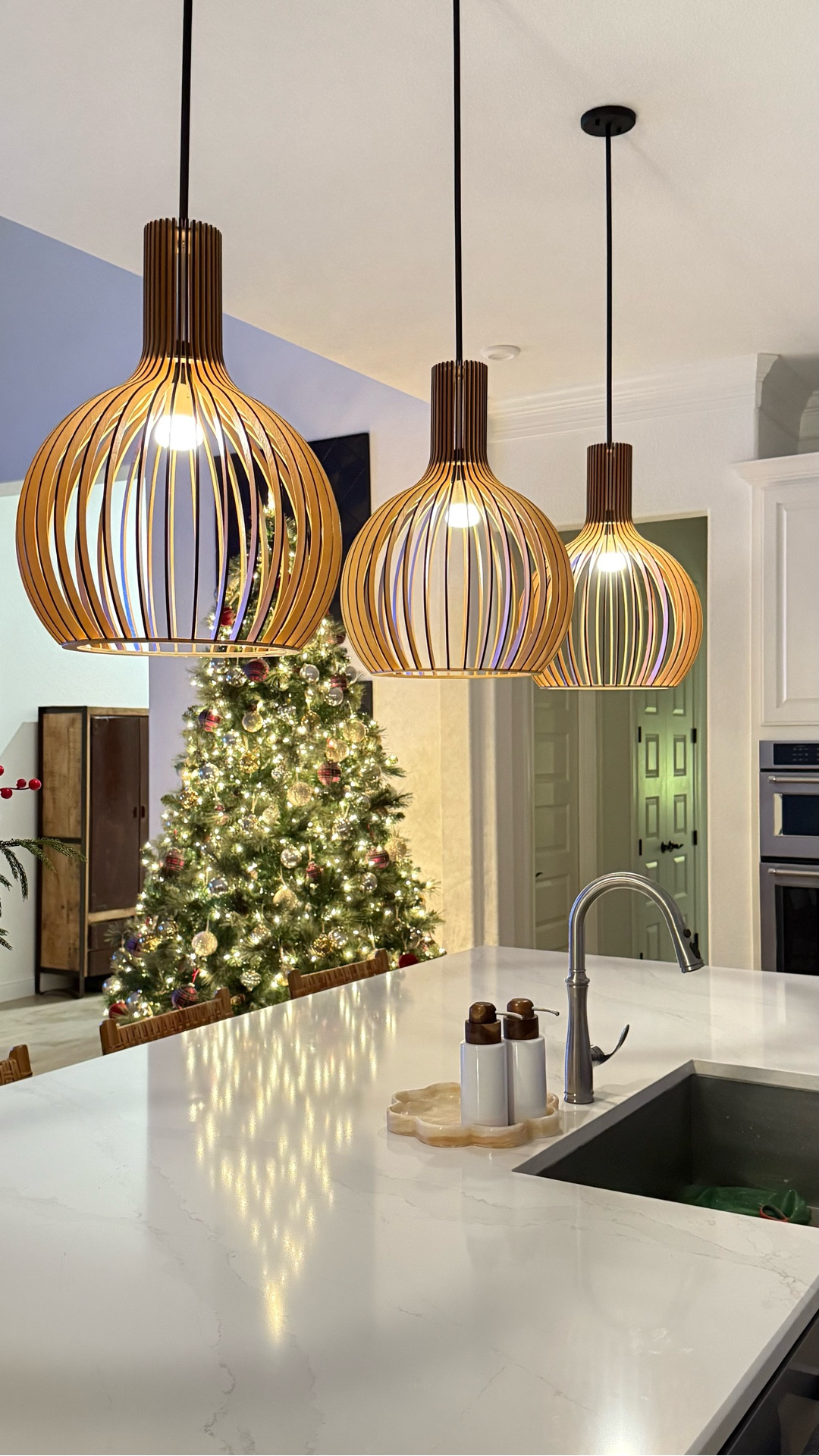 Wood kitchen pendant lights that add warmth and texture
These instantly make the kitchen feel cozy and pulled together.
The open wood frames add soft shadows at night and bring natural warmth into an all white space.


#lighting #kitchendesign #homedecorfinds #neutralhome #interiors


 

#LTKHome