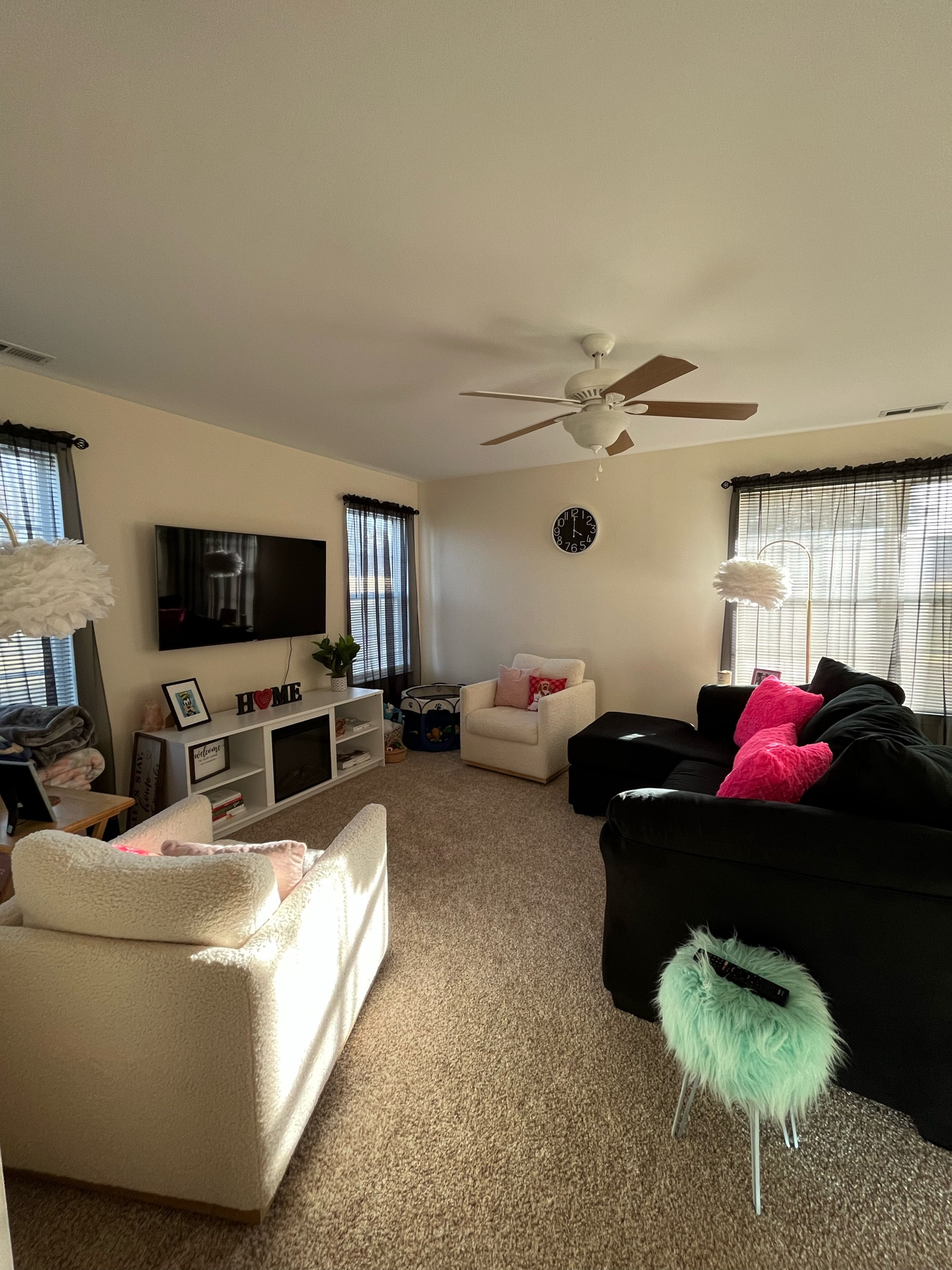 Living room. Chairs and pillows on couch from HomeGoods. Pillows on chairs are old from Kohl’s. Green stool from Hobby Lobby 

#LTKFind #LTKhome