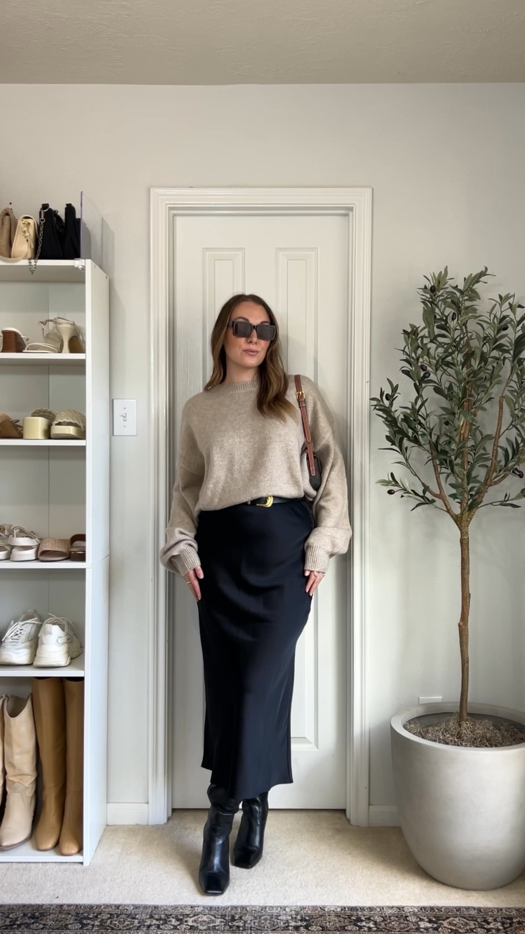 i'm not going to lie, i'm pretty sure my mom wore this same outfit to work when i was a kid, and now i get it 🥰🖤 i'm a sucker for midi skirts this season, so you'll be seeing a lot more of them! 😘⁠

Skirt S 
Sweater 10 (I wanted it oversized) 
⁠.⁠
.⁠
.⁠
.⁠
capsule wardrobe, neutral style, minimalistic aesthetic fashion, aesthetic style, fashion style, streetwear style, Pinterest girl, Pinterest aesthetic, Pinterest style, casual style, fall style, fall outfits, cute fall style, effortless chic, outfit inspo. #falloutfitideas #fashioninspired #pintereststyle #pinterestoutfit 

#LTKstyletip #LTKfindsunder100 #LTKSeasonal