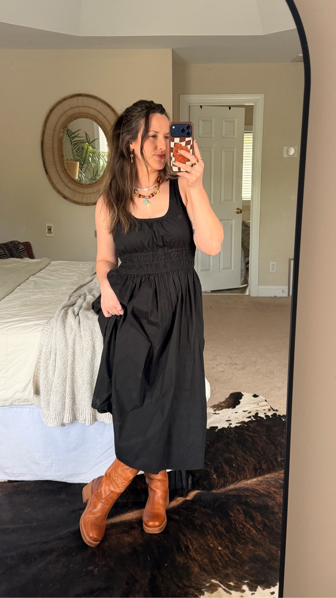 Man does getting out of my routine really throw me offfffff. First day back from spring break and felt like getting cute and getting myself out of this slump 🌻 

Country fashion is something that alwayssss influenced my outfits because I am a dandelion at heart, born in a southern city who wants to escape to the wide open country fields with her family 🫶🏻

These boots are the perfect blend of country western and modern trends. I love a camel brown and this western stitching is so good. Never go wrong with a black dress. I feel like this is the perfect spring transition outfit and would be great for summer country concert.

My dress is from Loft but last season so no longer available, but found a few really great similar options from Nordstrom Rack and Amazon

#StyleOver30 #spring2026oitfit #LTKCountryConcert

#LTKootd #LTKmomlife