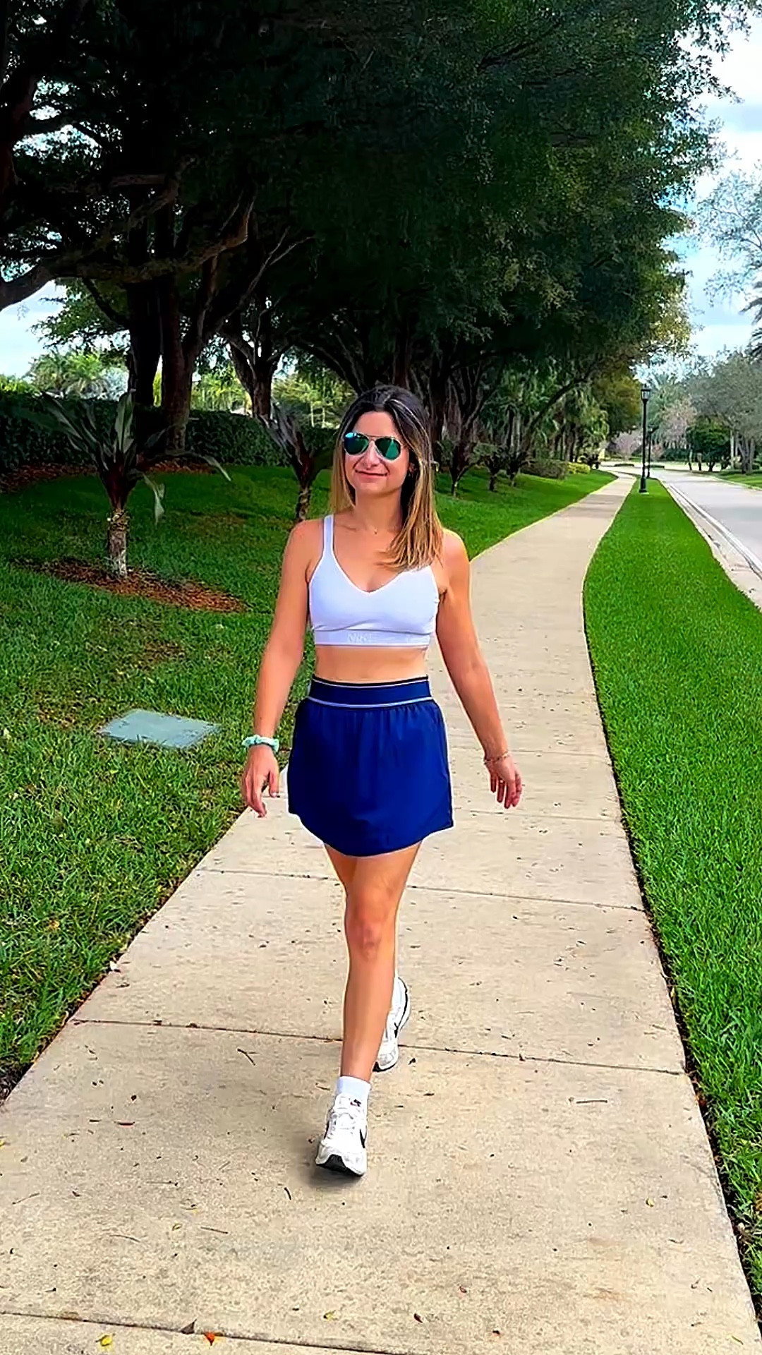 Loving this expensive looking tennis skort from Walmart! Affordable, cute and multiple pockets? Total win! 

#LTKPetite #LTKActive #LTKootd