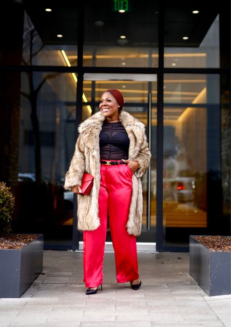 Black and red outfit with a faux fur jacket for winter . Red satin pants, black sheer tops , faux fur coats , date night outfit , Valentine’s Day outfit idea 

#LTKmidsize #LTKSeasonal