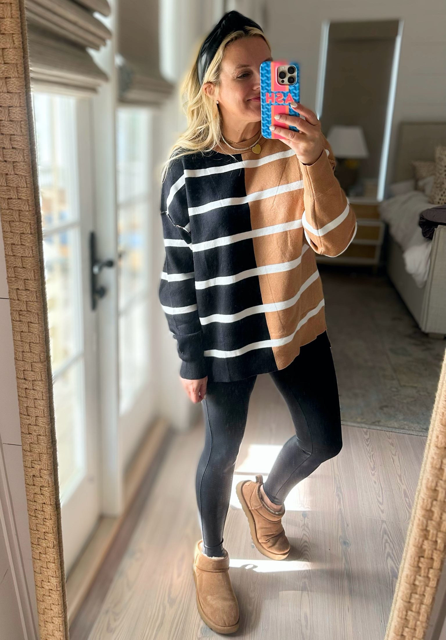 Super cute Amazon sweater. Wearing size small. Leggings are the best faux leather and I’m in size small petite  

#LTKfindsunder100 #LTKSeasonal #LTKstyletip