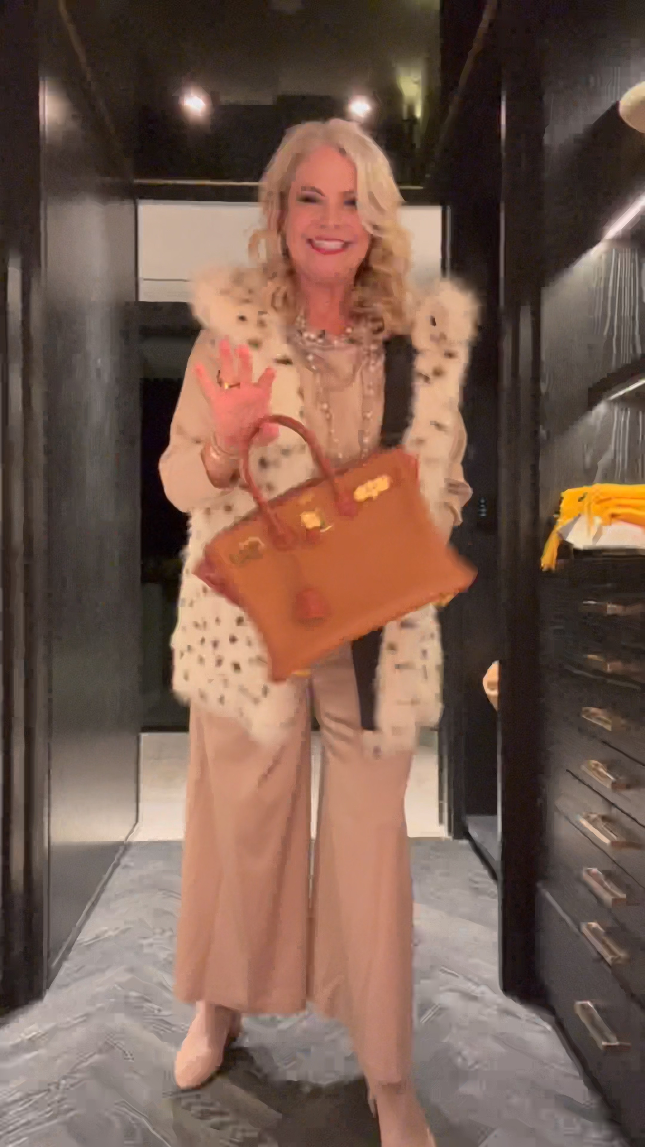 How to dress up a monochromatic outfit 👜. Silk outfit Elaine Kim, boots Stuart Weitzman, white fur vest,, birkin, earrings Kwait hoops, emerald cocktail ring 

#LTKSeasonal #LTKover40 #LTKMostLoved