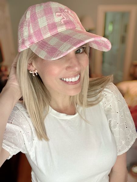 Pink bow baseball hat, bow earrings, eyelet t-shirt 

#LTKFindsUnder50 #LTKFindsUnder100 #LTKOver40