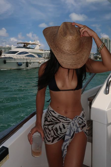 summer boat day bikini inspo black uncle studios bikini top and bottom, amazon zebra sarong, cowgirl hat

#LTKTravel #LTKStyleTip #LTKSwim