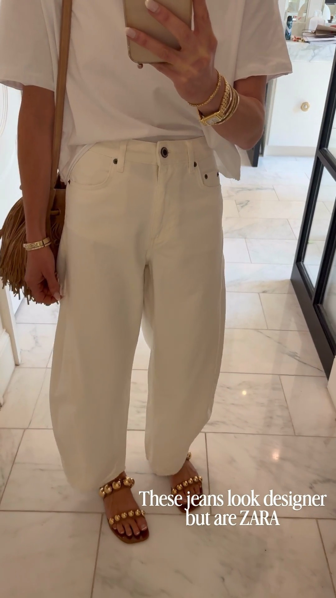 Outfit of the day is white on white with some cute brown accessories! My shirt is 23% off on Amazon and my @Zara balloon jeans are under $80 🤍

Wearing size 2 in jeans 
Small in top

#LTKjeans #LTKstyletip