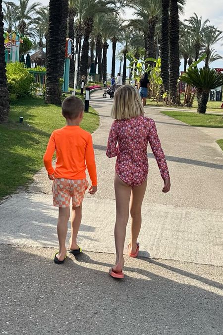 Kids swimsuits from Target! Love the quality of the long sleeve rashguard for girls and long sleeve rashguart shirt for boys with matching board shorts. Also loving their kids flip-flops or slides

#LTKkids #LTKtravel #LTKswim