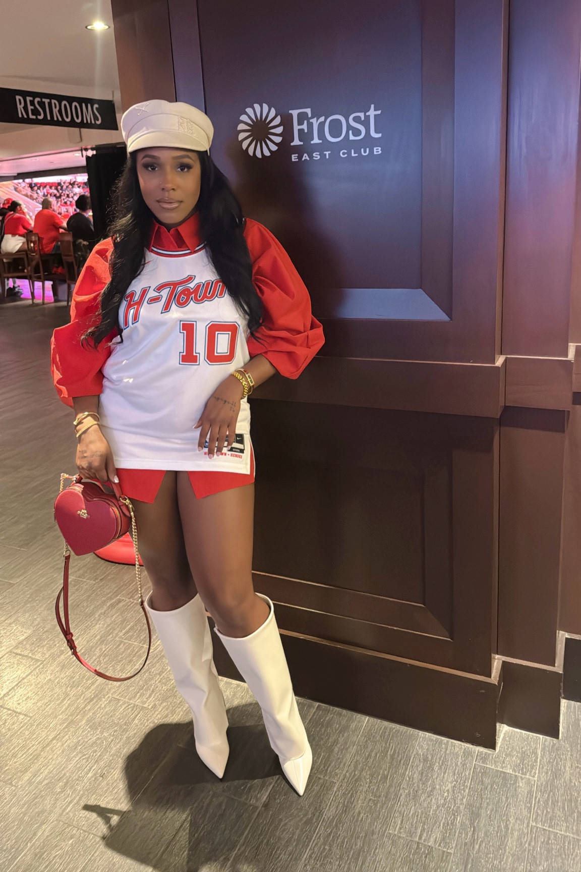 This was the cutest Monday Night Game look. I’m going to link everything I can below. They no longer sell this coach red heart purse but Amazon may have a dupe. Also this is a Ruslan Baginskiy Hat, you have to order from their site. 
Boots, Dress and Jersey linked — they also just stopped selling the h-town edition jersey #basketballgameoutfit #gameoutfitideas

#LTKSaleAlert #LTKShoeCrush #LTKFindsUnder50