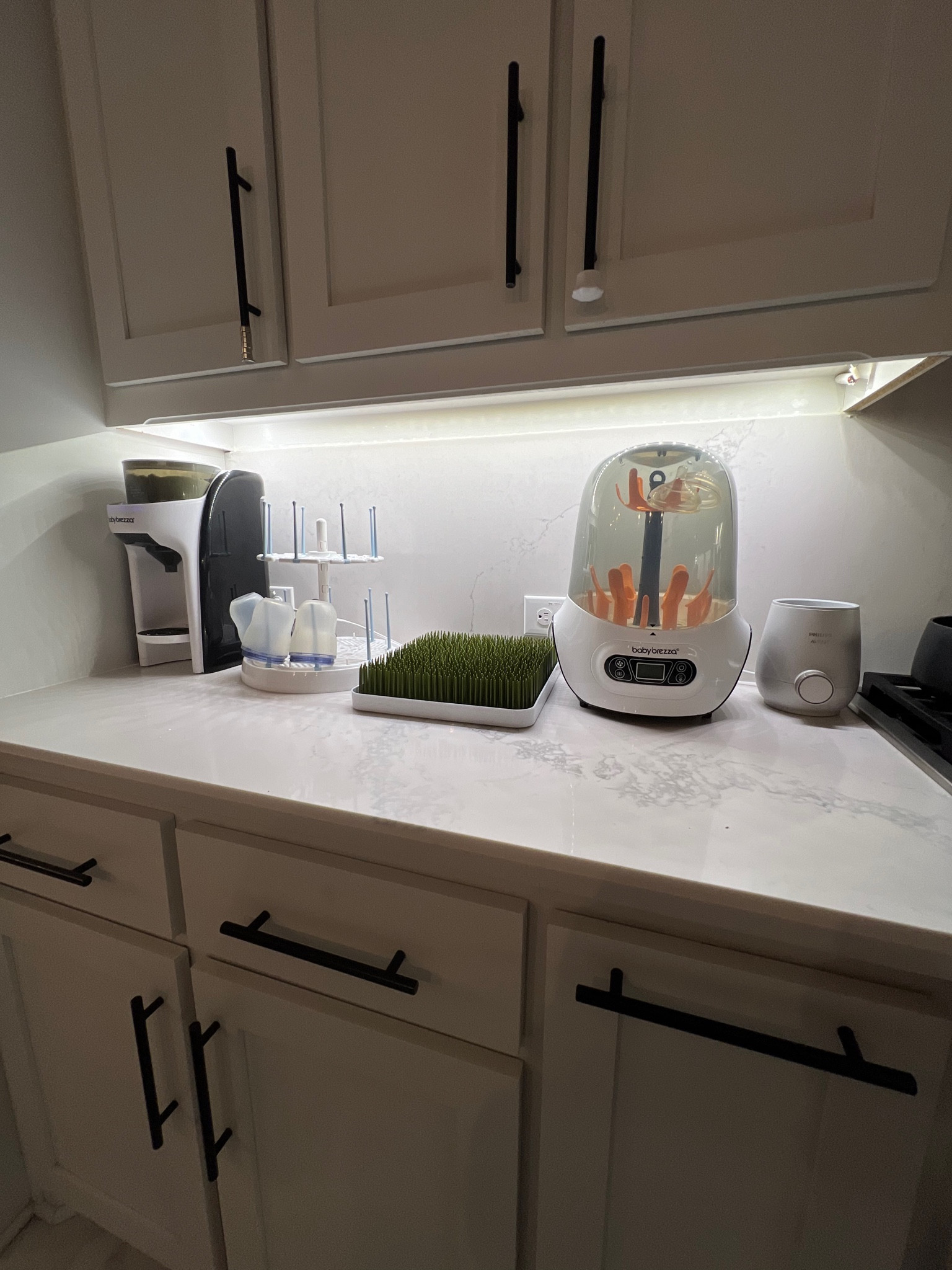 Baby nook in our kitchen! The Baby Brezza has been a game changer for our third time around! Perfect for any new parents! 

#LTKhome #LTKGiftGuide #LTKbaby