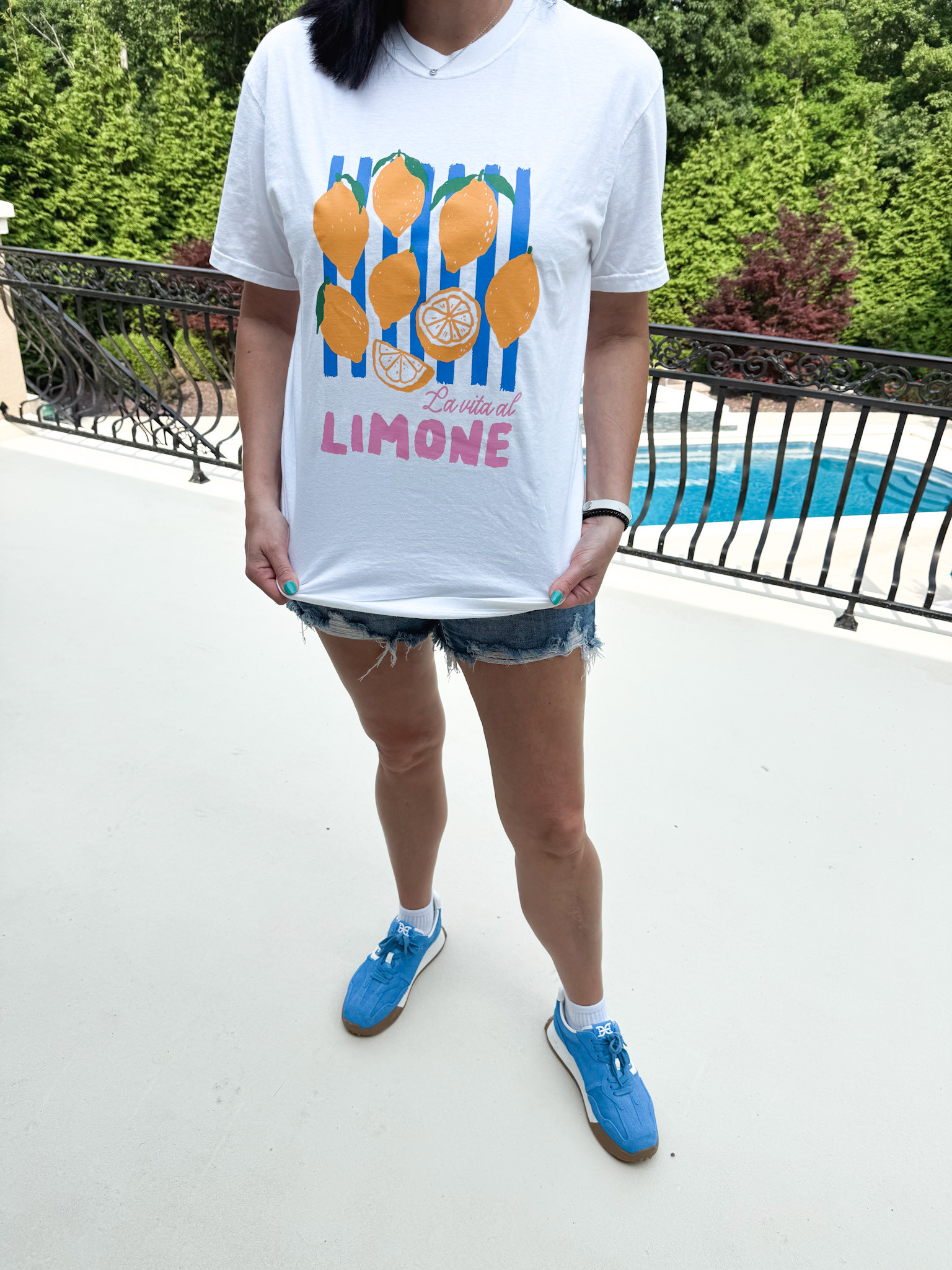 Putting the la vita è bella in my closet with this lemony-fresh tee 🍋✨ Styled it with jeans shorts for errands, but also throwing it over a swimsuit for pool days. The colors? Chef’s kiss. Linking under summer style, because trust me—this one’s juicy. #LTKsummer #coastalstyle #foodiefashion 

 #LTKSummerEdit #LTKTravel