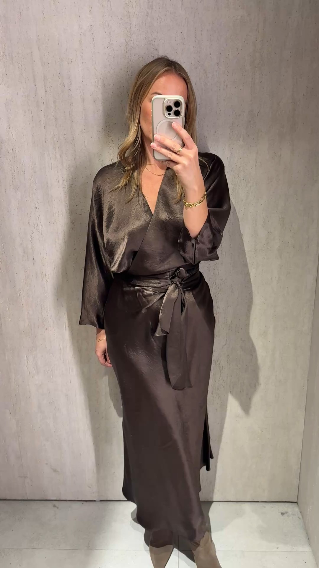 So many questions coming in about partywear or something a bit more special for a nice meal or drinks. 
I think this dress answers those questions and you can wear it throughout the year. 
It’s a shape that’s universally flattering , a cleverly cut wrap style where the wrap and length of the body (shoulder to waist ) is flexible . 
The fabric feels luxe and drapes well for an acetate. 
It’s a dark olive/brown shade and I’m wearing the large here. 

Teamed with these amazing suede boot in a tonal shade - I’ve been buying these boots a lot as the shape is great with ankle jeans /wide legs and dresses!  They are fantastic quality and a good price . They come in chocolate brown too. 

#LTKdatenight #LTKdresses #LTKpartywear