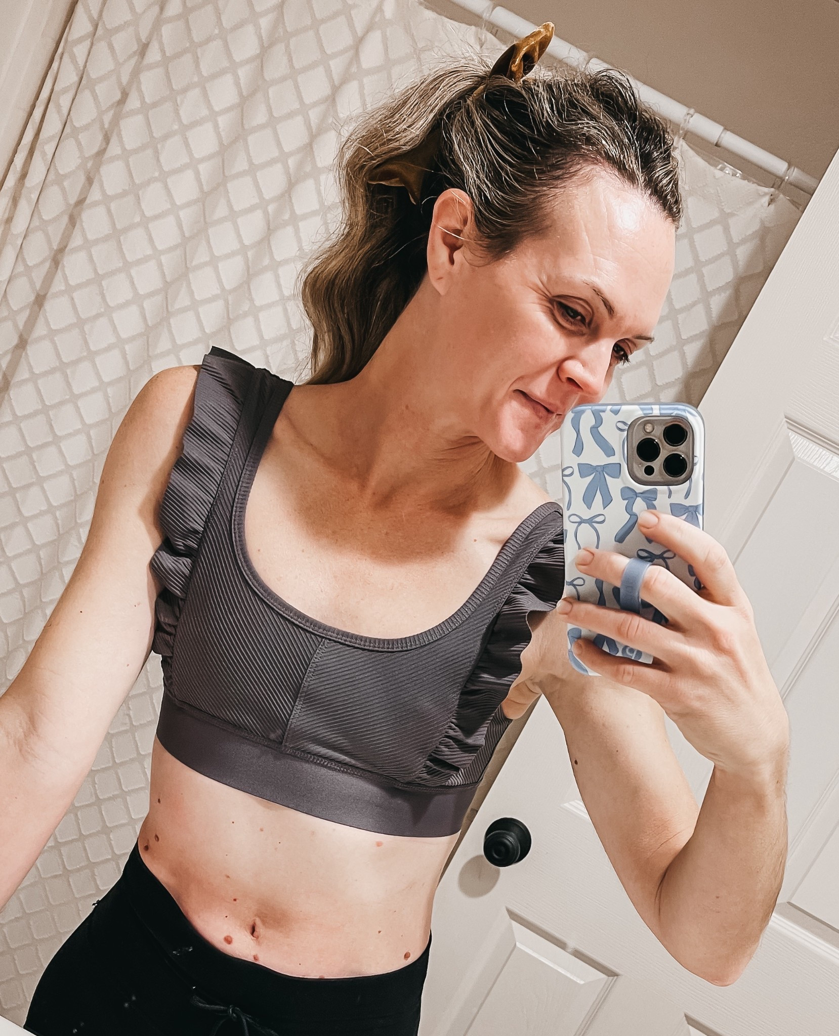 So nice I bought it twice! The ruffle bra I just got in white also comes in this gunmetal grey and black. Fits TTS, wearing a small. 

#LTKFindsUnder100 #LTKmorningroutine #LTKfitnessgoals
