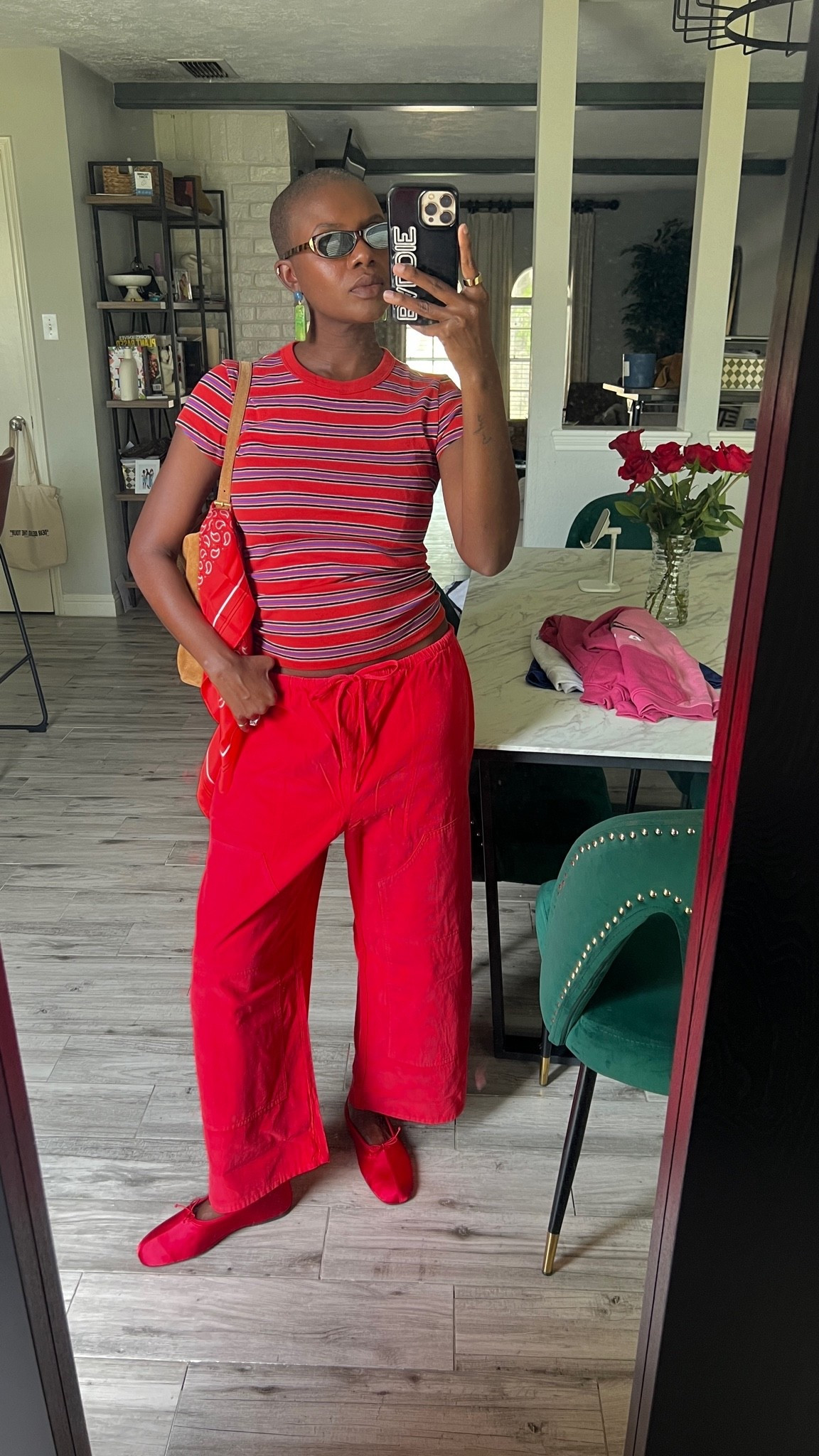 Fun way to wear red s we enter fall! Striped red T-shirt, light red corduroy pants, red balet flats and a khaki suede bag.

#LTKootd #LTKgrwm #LTKdayinmylife