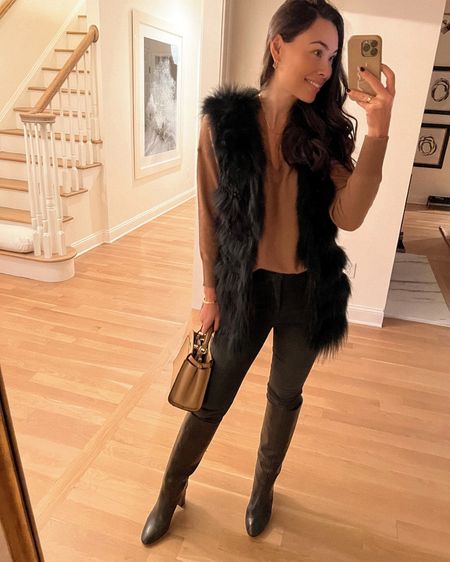 Kat Jamieson of With Love From Kat shares a classic outfit. Faux fur vest, camel sweater, black skinny jeans, leather boots, neutral style, winter style. #vest

#LTKshoecrush #LTKsalealert #LTKSeasonal