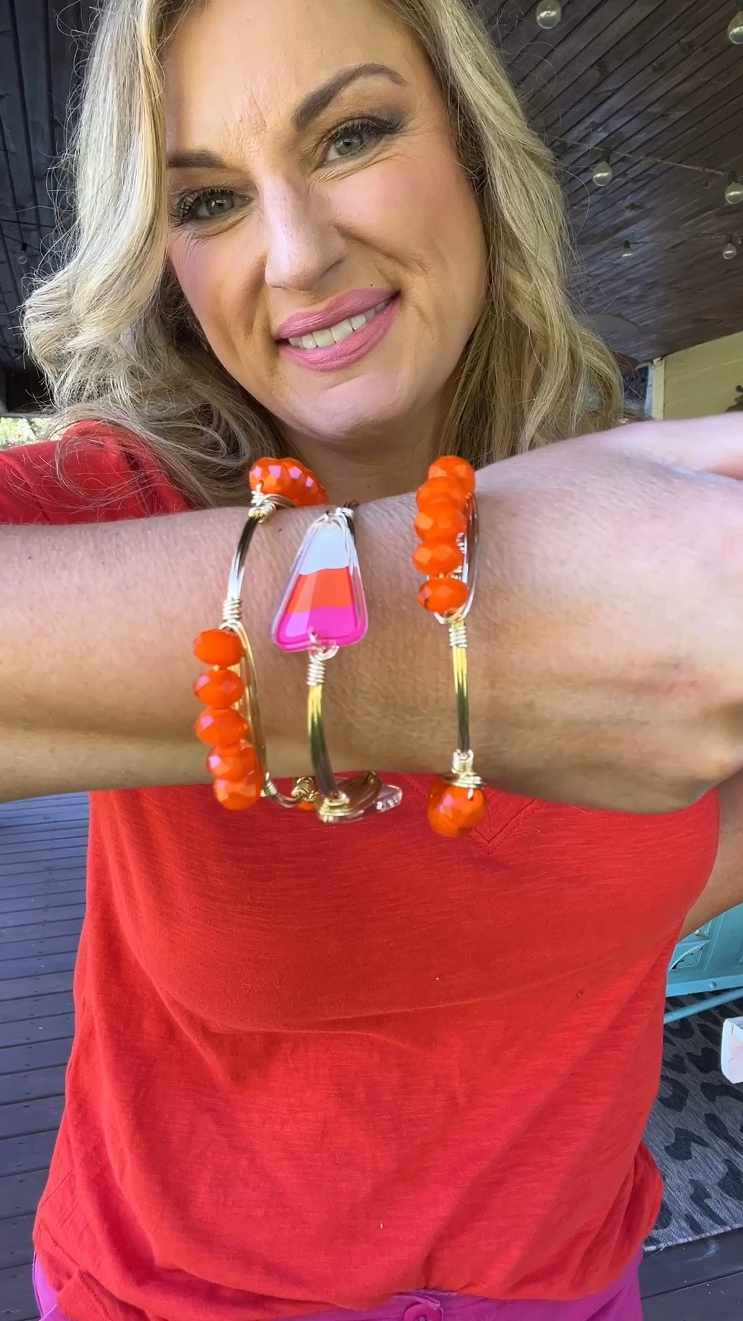 Candy corn bangle bracelet in hot pink and orange surrounded by two orange bangles 

Also great for University  of Tennessee fans 

#LTKStyleTip #LTKFindsUnder50 #LTKOver40