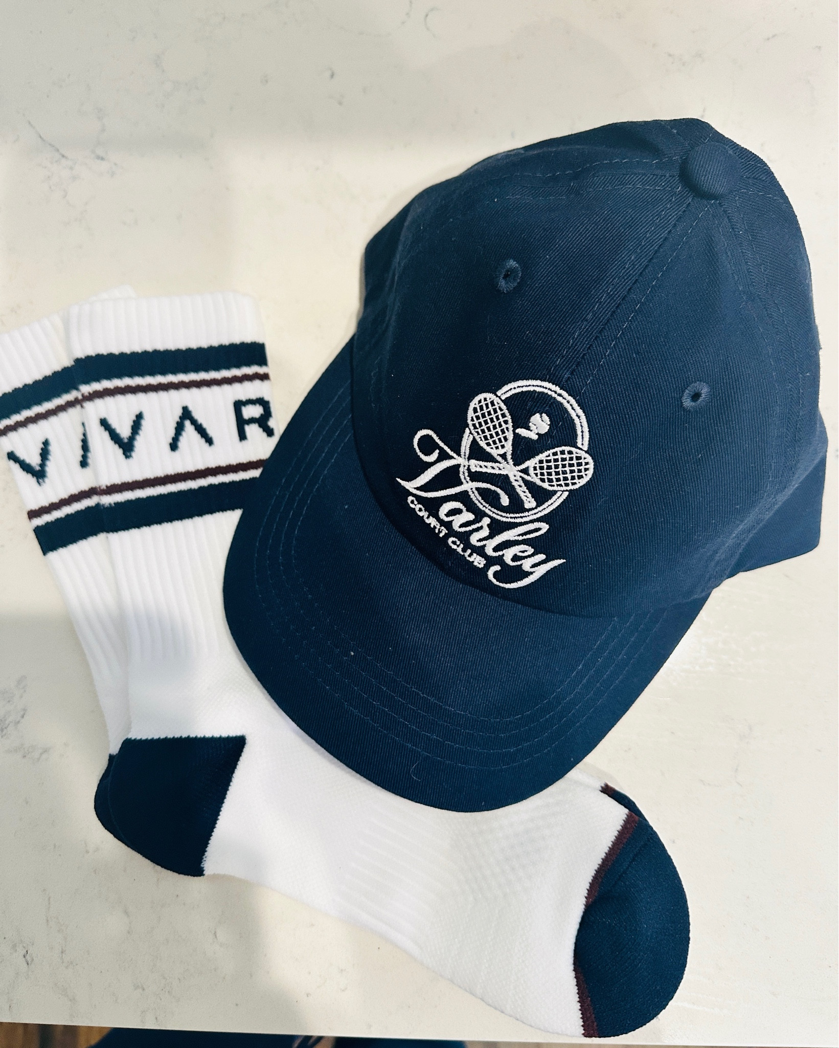 New Varley club accessories, pickleball hat, navy cap, socks, court, athletic, active branded socks, not club cap, cardigan, knit, Jaclin Natale 

#LTKfindsunder50 #LTKfitness #LTKtravel