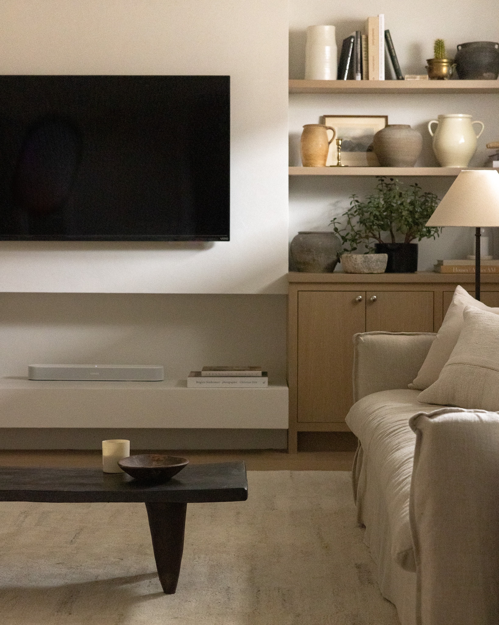 Shelf styling for the coziest basement rec room! 

#LTKhome