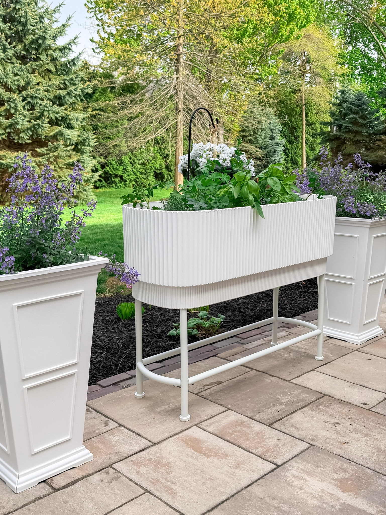 We’re not wasting any time enjoying the (finally!) warmer weather here, and these  planters have seriously elevated our backyard. While the tall planters would flank a front door beautifully, I’m using two of them to bookend our patio dining space. And doesn’t this raised garden bed make for the perfect herb garden? I love that the planters are lightweight and easily moveable, but also durable enough to withstand even harsh Cleveland weather.  

#LTKSeasonal #LTKHome
