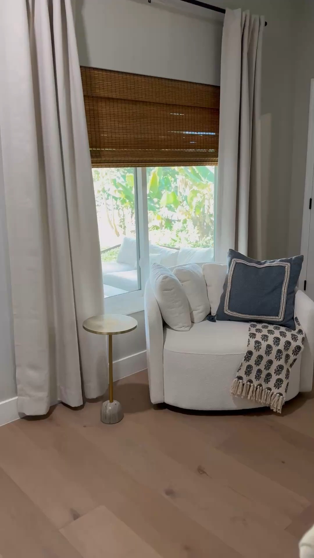This is a really great swivel chair and is a perfect pottery barn dupe.  Home decor, woven blinds, living room decor ￼

#LTKdayinmylife #LTKHome #LTKvlog