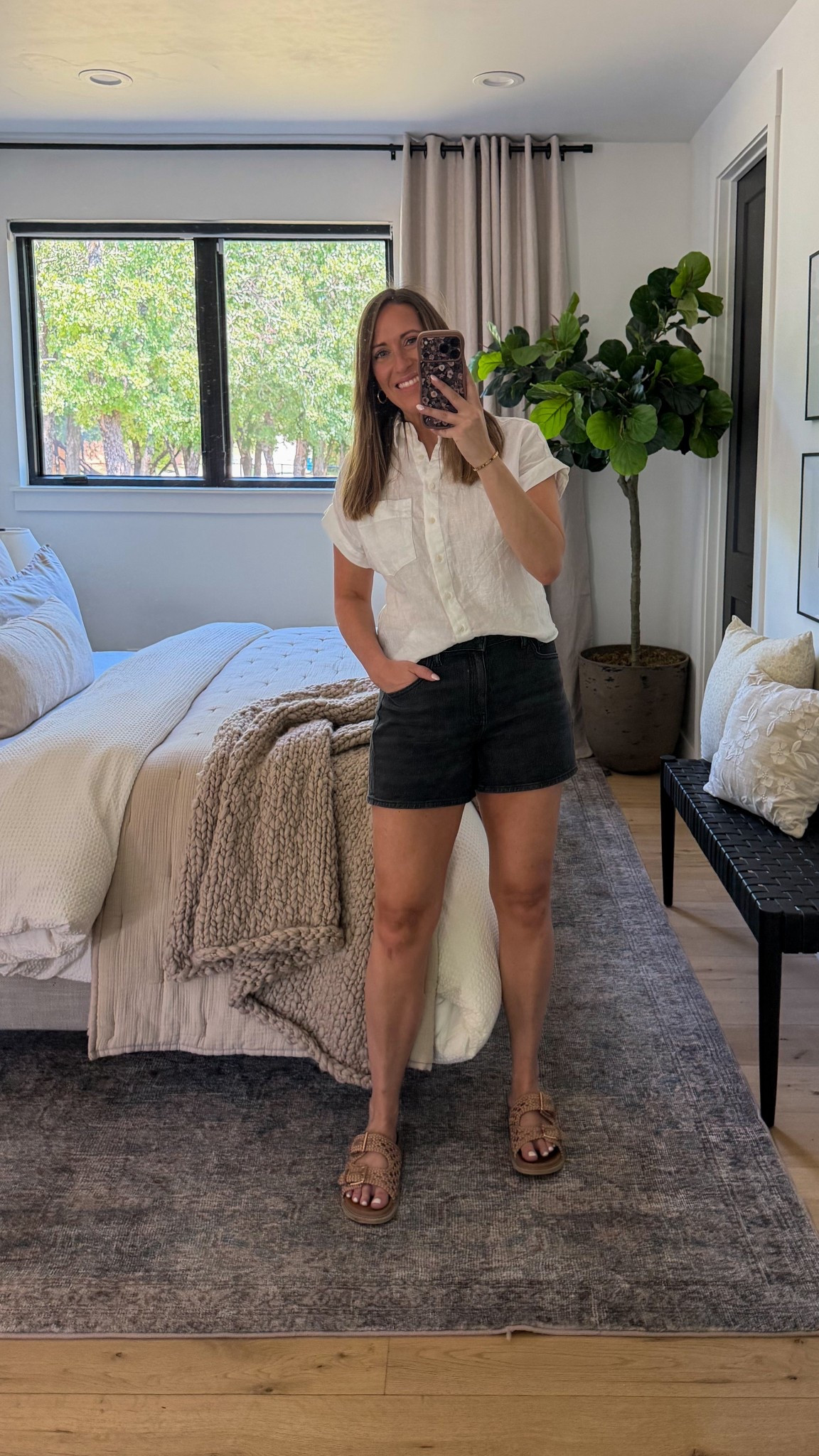 This has been my go-to everyday outfit lately 🤍 effortless, comfortable, and still feels pulled together. The Quince white Camp linen shirt is lightweight and breathable (perfect for warm days), and the Bella stretch jean shorts in black are so flattering with just the right amount of stretch. Wearing a size medium in the shirt and size 29 in the shorts!

I love how easy this combo is to throw on…whether I’m at home, running errands, or heading out for the day. Simple pieces, but they just work every time.

Keywords: quince outfit, linen shirt outfit, black denim shorts, summer outfit ideas, casual everyday style, effortless outfit, neutral wardrobe, capsule wardrobe, warm weather outfits, minimal style, mom outfit, casual chic, breathable clothing @Quince 

#LTKMidsize #LTKdayinmylife #LTKootd