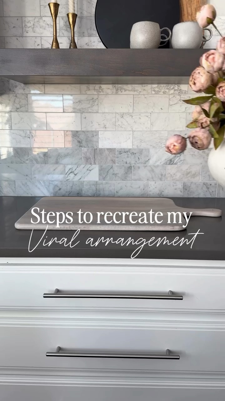 I’ve been getting DMs asking how I made this viral faux peony arrangement, so here are the exact steps I used 😊

These peonies go in and out of stock so quickly but I also found a nearly identical Amazon version that comes in several colors. 💐

I used 11 stems total. The easiest way to make faux florals look high end is using more stems than you think you need and grouping them tightly

viral peonies, faux peony arrangement, Michaels peonies, spring stems, faux florals, blush peonies, neutral home decor, designer look for less, coffee table styling, Amazon home decor 
#inspiremehomedecor #viralpeonies #affordablehomedecor

#LTKHome #LTKSeasonal