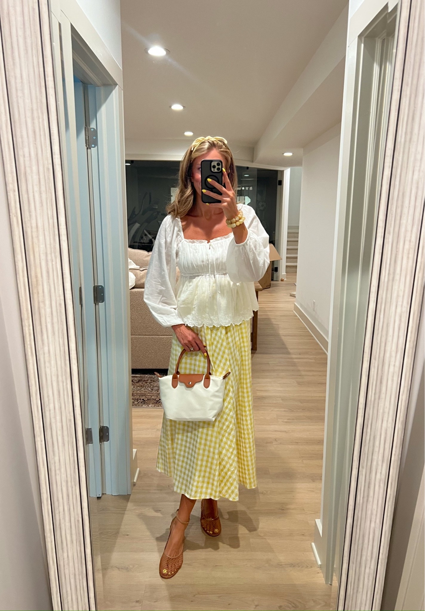 This blouse + gingham skirt combo feels straight out of a European summer! Sizing: small top & medium skirt

#LTKootd #LTKmomlife #LTKdayinmylife
