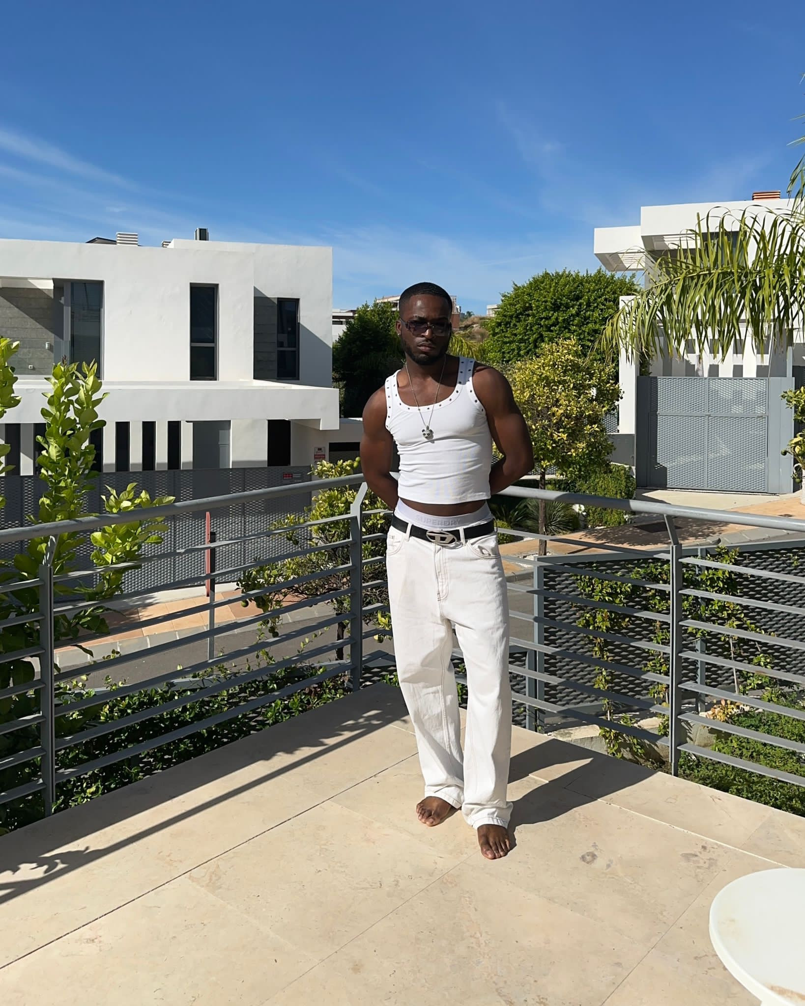 Holiday outfit ideas, white mens jeans, eyelet detail vest, white vest, diesel belt, brown tint sunglasses, chain pendent, bershka, H&M   

#LTKHoliday #LTKeurope #LTKmens