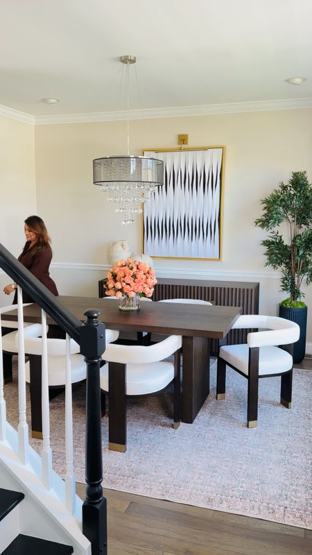 Shop my modern dining room table, reeded sideboard, dining chairs and accessories for a beautiful refresh!

Neutral rugs 
Beaded sideboard 
Wooden dining table 
Crystal chandelier 
Artwork 
Faux trees 
Planters 
Pottery 
Modern curved dining chairs 

#LTKSeasonal #LTKVideo #LTKhome