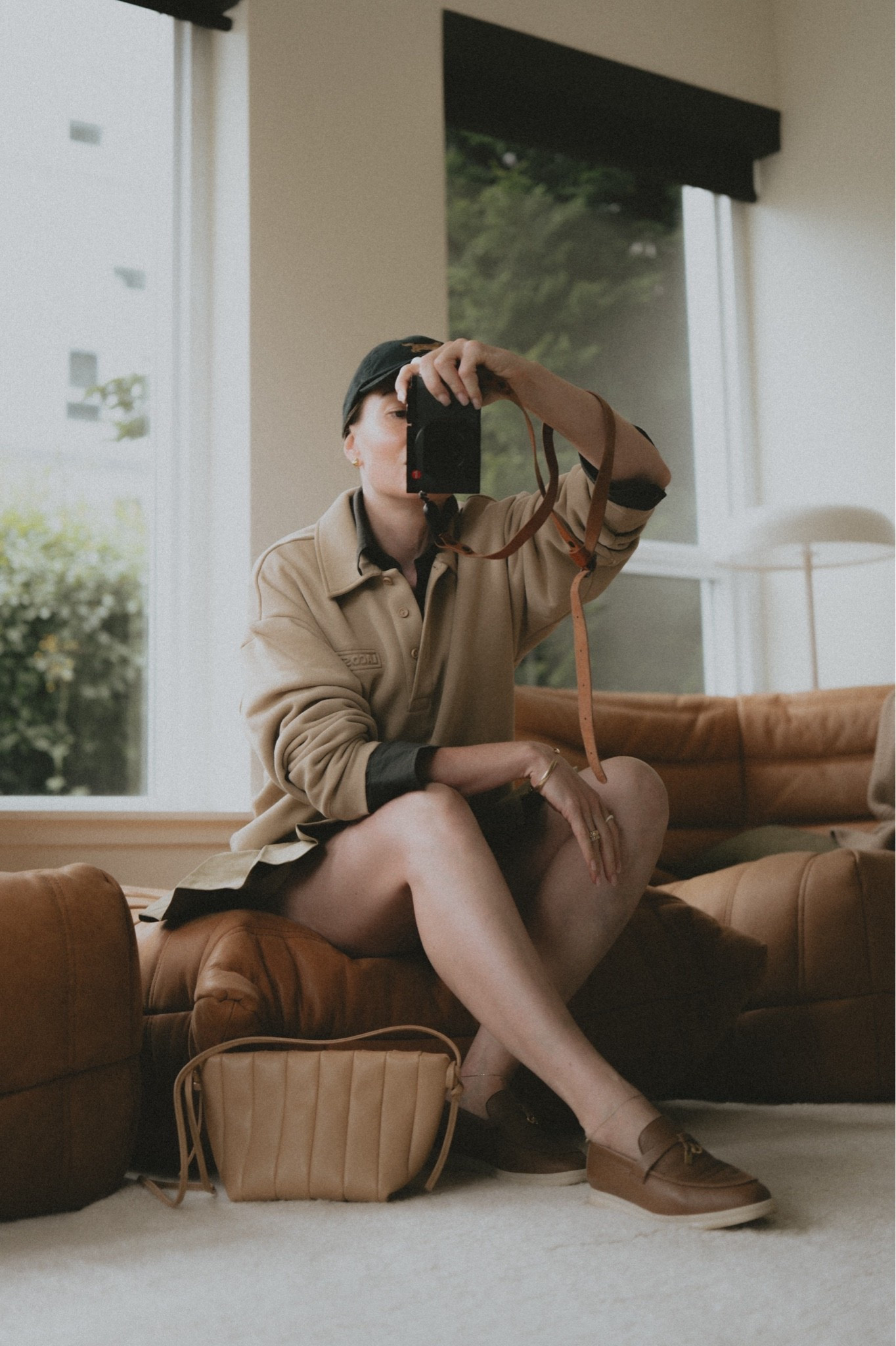It better not be windy. 
Polo sweatshirt + mini skirt + white soles + mini bag + baseball cap
Hat: Polo Ralph Lauren
Bag: Maeden Boulevard classic
Skirt: 7 for all mankind 
Shirt: Buck Mason

#LTKootd #LTKSeasonal #LTKWorkwear