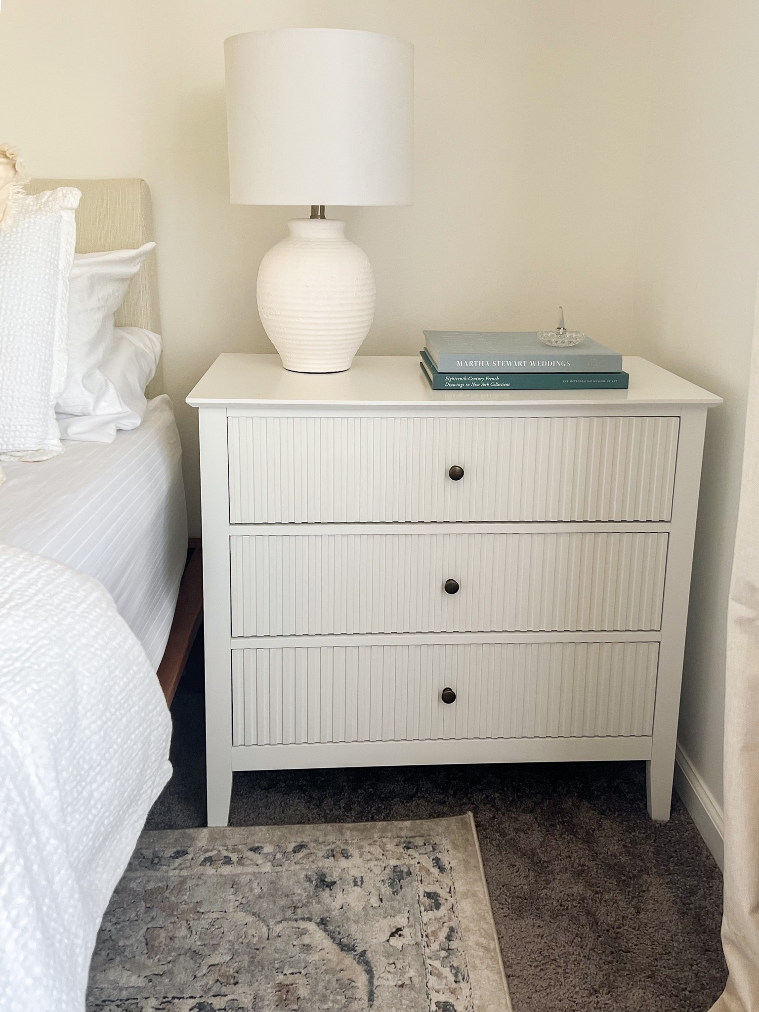 Affordable 3-Drawer nightstand from Amazon! I plan on changing up the knobs to match our bedroom better. This piece has soft gliding drawers and looks so expensive! Would be perfect in adult or kid’s rooms. The drawers are pretty shallow so I wouldn’t use for as a dresser but it’s the perfect nightstand!🏡

Amazon find
White nightstand
Beachy room
Coastal decor
Furniture

#LTKsalealert #LTKhome #LTKfamily