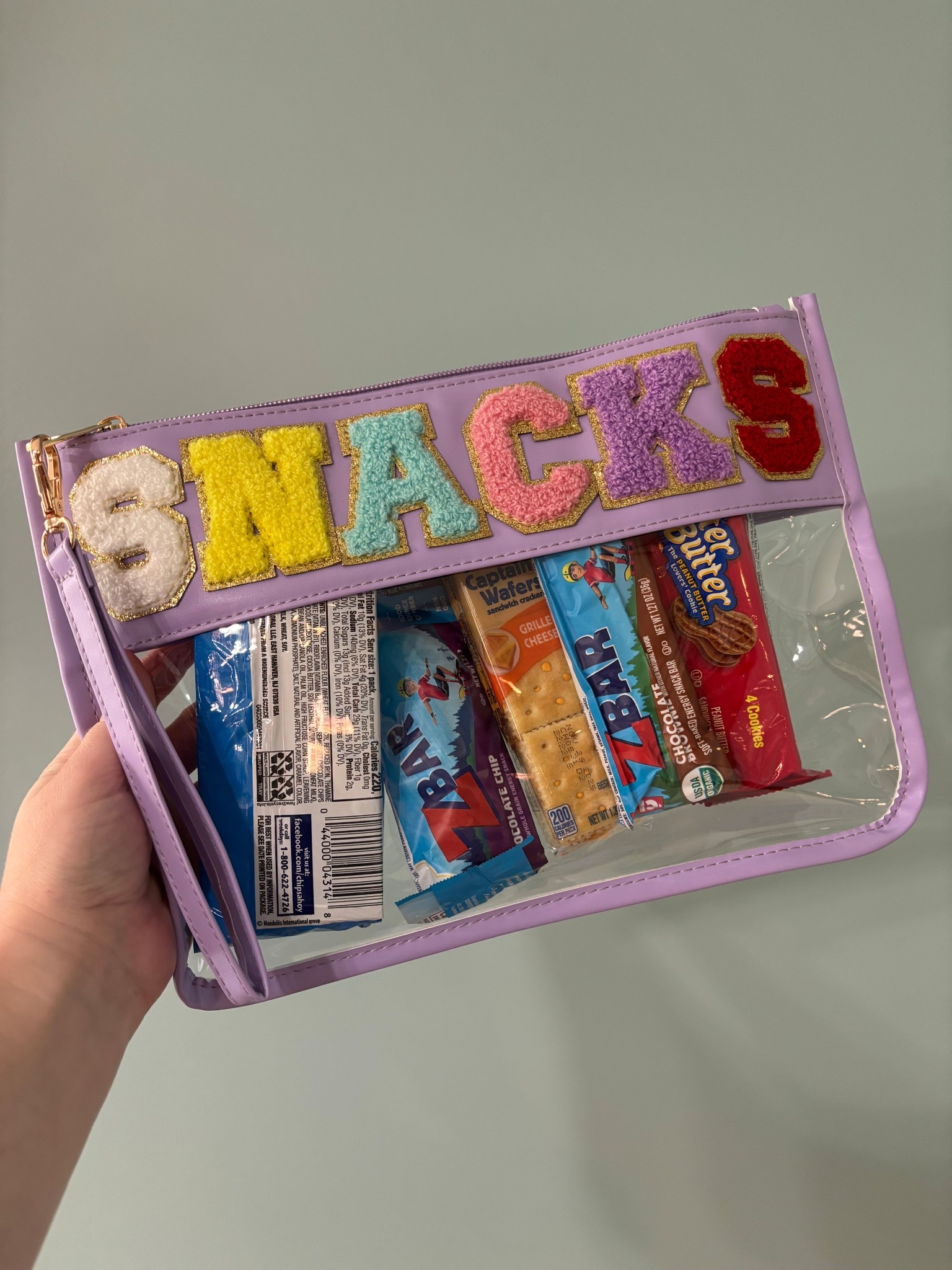 Snack Bag! 

My kids are the King & Queen of snacks! Literally my ENTIRE family knows that if they need a snack I got them! 🤣

I absolutely love this cute snack bag to carry my kiddos snacks for travel & at home adventures. I also would like to get another one just to keep in our vehicle in case of a snack emergency. 

This will also be perfect for traveling to Disney with the wristlet I can attach it right to our stroller. 

#snack #snackbag #kids 

#LTKFindsUnder50 #LTKFamily #LTKKids