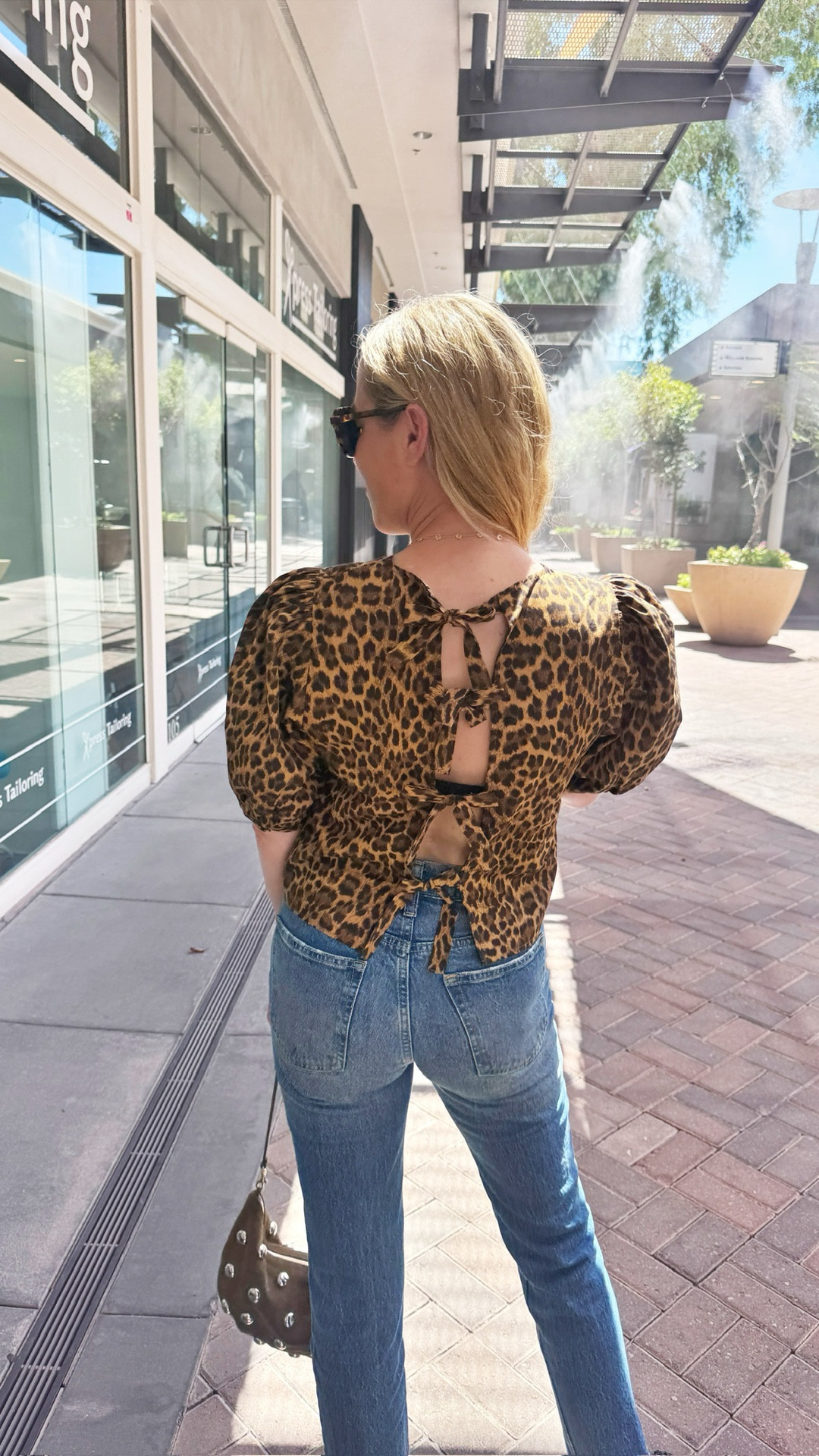 Date night top!! 

Laura is loving this sexy but classy tie-back leopard blouse from Sezane. Has a puff sleeve as well and looks great with black or regular jeans! Exact jeans sold out - linking similar, which is the Levi wedgie and is fab on the booty 👏🏻

Runs tts. Laura in a small. 

#LTKSeasonal #LTKOver40 #LTKStyleTip