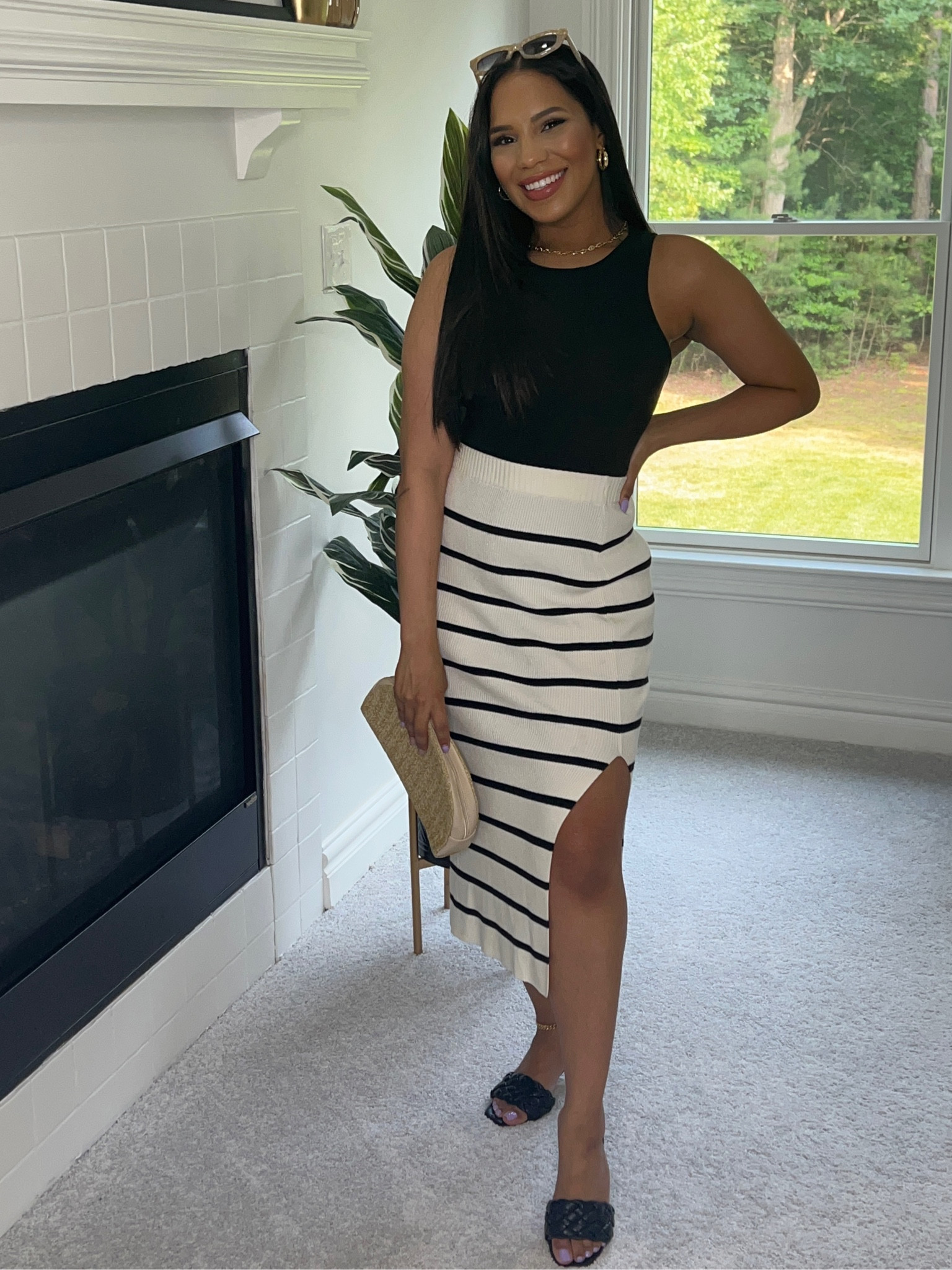 Resort style outfit or vacation outfit. Knit stripped skirt and black bodysuit  with black heels. Skirt is under $30. Wearing some SMALL, runs TTS. Shoes on sale! 

#LTKunder50 #LTKsalealert #LTKtravel