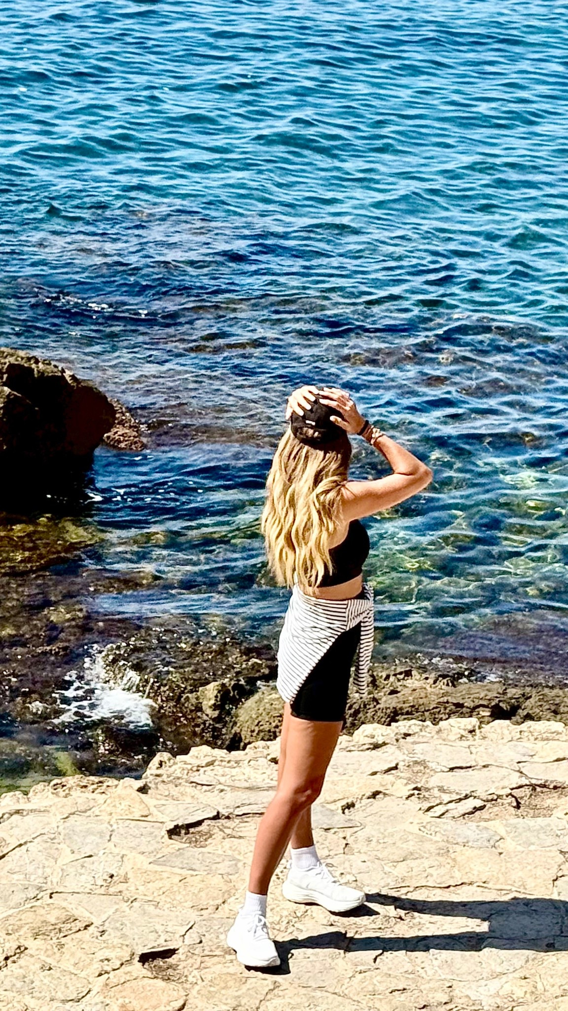 Exploring Mallorca! You can’t tell from the pic but this sports bra is one shouldered and so chic and only $28! The matching biker shorts don’t have a seam up the front 🙌🏻🙌🏻🙌🏻🙌🏻 and are booty lifting! Striped tee is old :( 

Shorts small.  Top medium. 

#LTKFindsUnder50 #LTKActive #LTKTravel