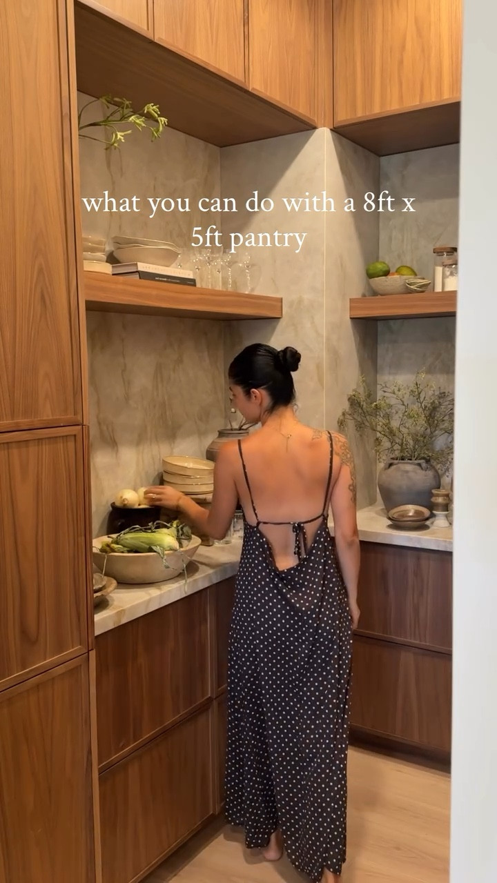 bc this is my favorite version of the pantry yet.🤍

took my horizontal builder grade pantry and added vertical storage with hidden compartments (appliance garage with toaster oven not shown)

& added an arched niche with leftover Taj Mahal quartzite pieces to display wine, glasses, or whatever I feel like in the moment.