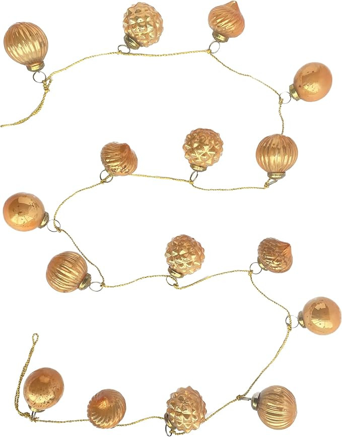 Creative Co-Op Embossed Mercury Glass Ornament Garland on Gold Cord, Apricot Color | Amazon (US)