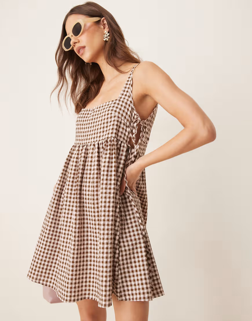 ASOS DESIGN tie side baby doll mini dress in brown gingham-Multi | ASOS (Global)