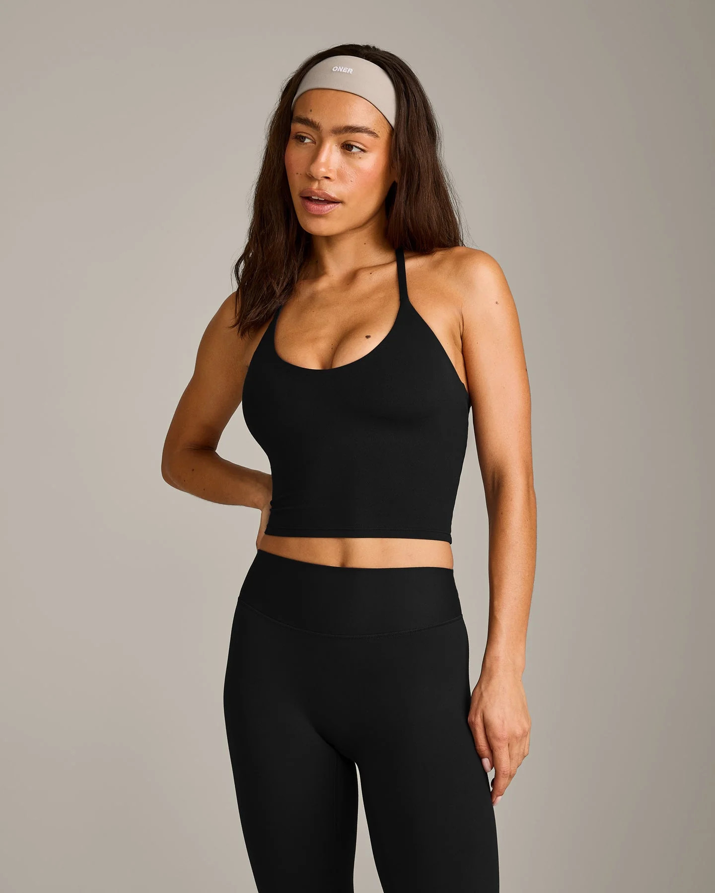 SoftMotion™ Strappy Halter Neck Mid Tank Top with Built in Bra Shelf with Gray Logo | Peach Ora... | Oner Active (UK / US)
