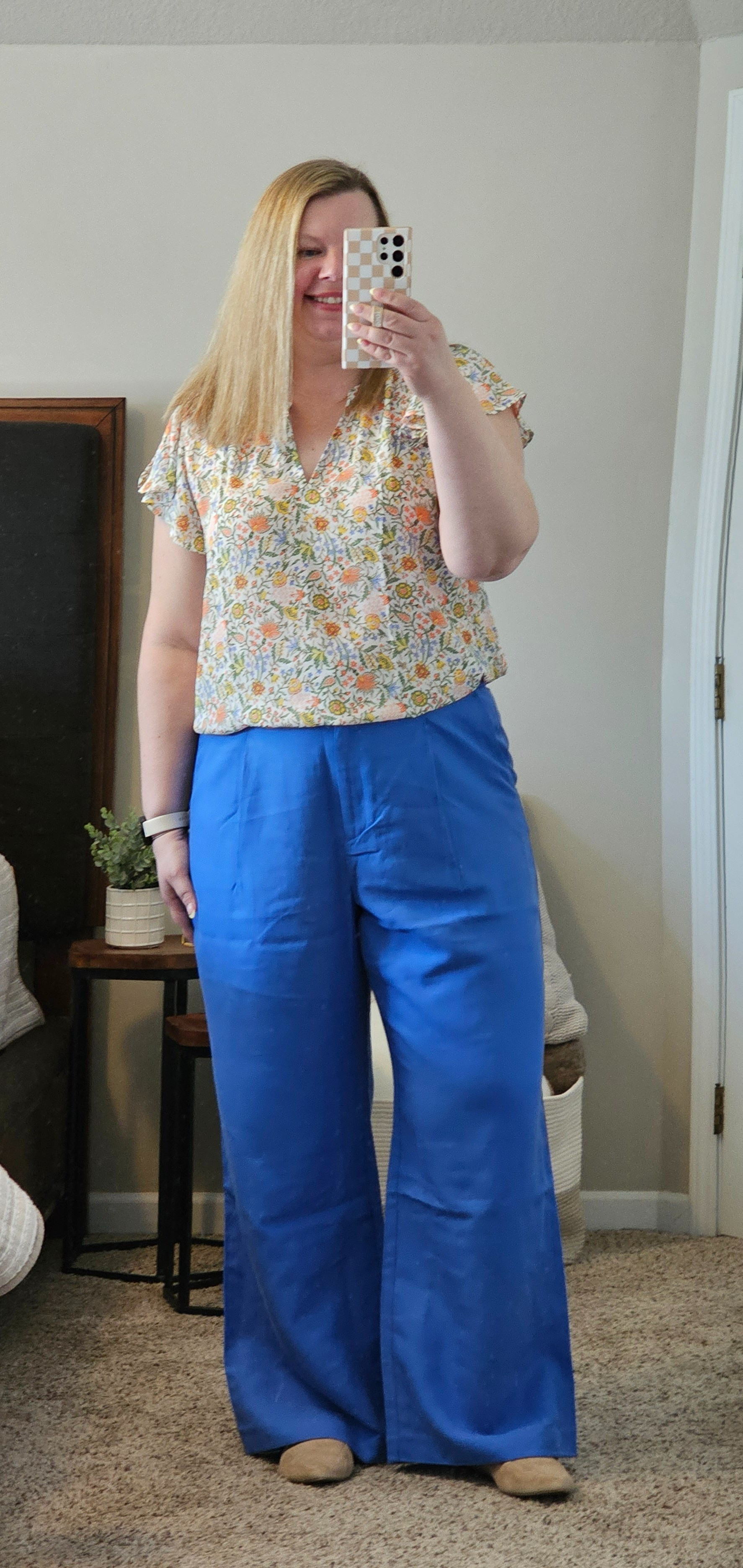 I love this flower floral top for work! It also comes in a t-shirt option for a more causal look.  These trouser pants are a great bright blue lightweight material.  Linking some kick crop flares as well in a similar color. 

#LTKover40 #LTKworkwear #LTKsalealert