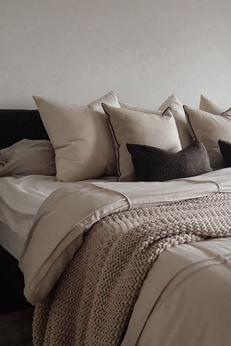 Slowly putting our primary bedroom together.

Neutral bedding, king bed, throw pillows, primary bedroom, bedding ideas, tonal bedding, gray headboard, gray bed frame, moody bedding 