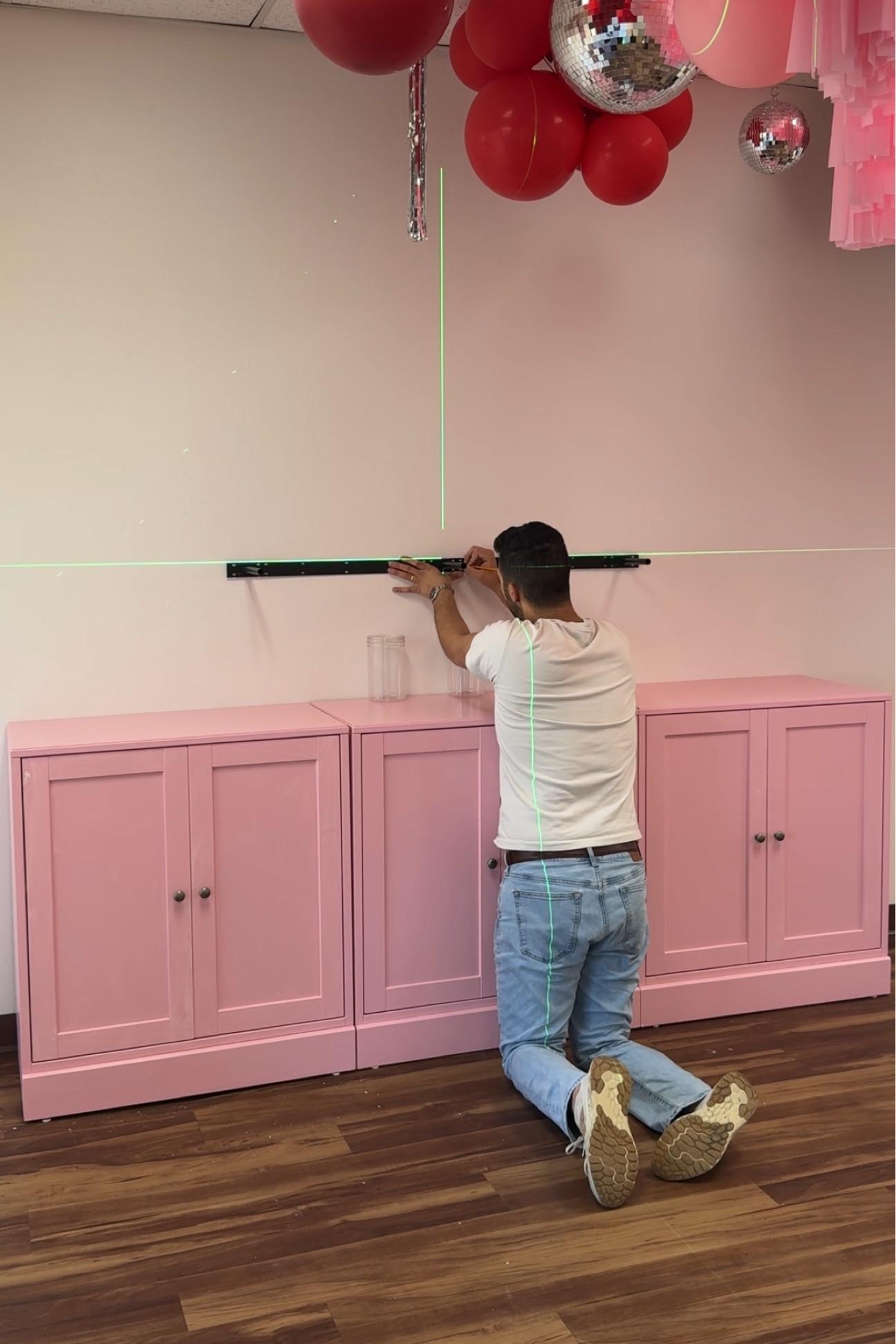 Laser level! Game changer for hanging things straight 🤪