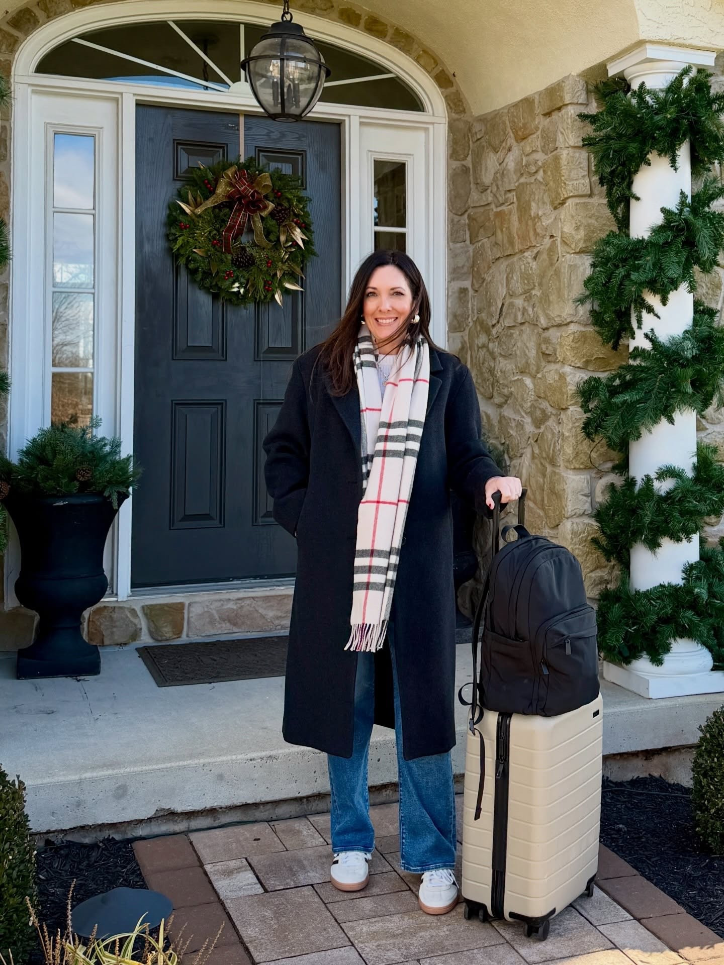 Winter travel style! ✈️🧳 Off to Nashville for a quick trip to bring my daughter home from college (sharing more in Stories). It’s freezing out, so I layered up—a polished coat, a cozy sweater, jeans, and sneakers for the win. 