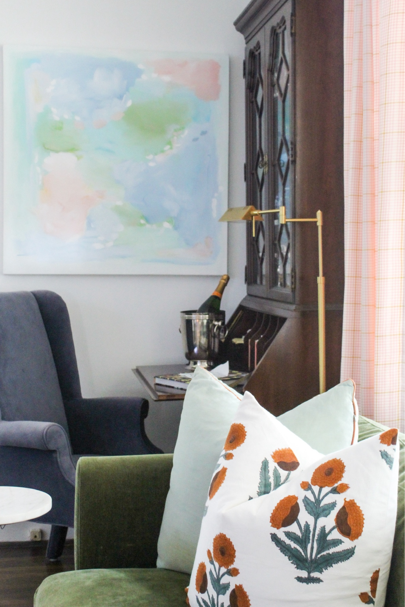 A true #workinprogress for the living room project that just won’t end 🥵 Fhis room has truly been so hard to figure out. As it stands, there’s a change coming to the secretary chair & pillows, at a minimum 💗

The other side of the room is awaiting the banquette that is severely delayed (UGH) and a frame photograph in progress now then a few pillows to finish the space.

Back on the opposite side of the couch, the antique dresser just got a glow-up with a fun piece of marble added to the top and a refresh on the #tabletop decor.

Let’s home this room, which I planned to be finished in April, will actually be done end of September 👏🏾

Shop the pieces I currently have: library lamp, block print pillows & curtains. 

#LTKFindsUnder100 #LTKHome #LTKSaleAlert