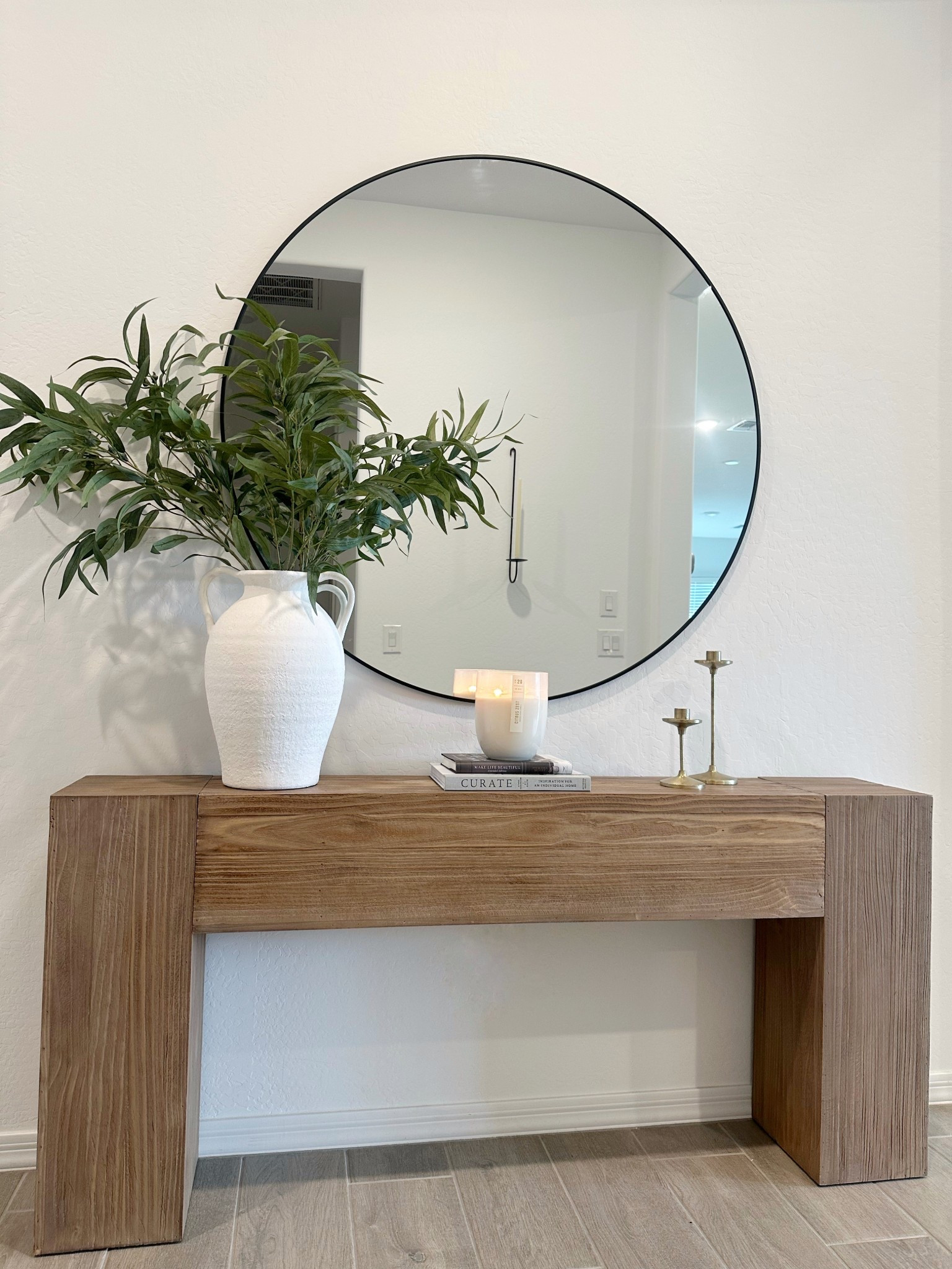 Simple entry way 
48 in round mirror 


#LTKHome