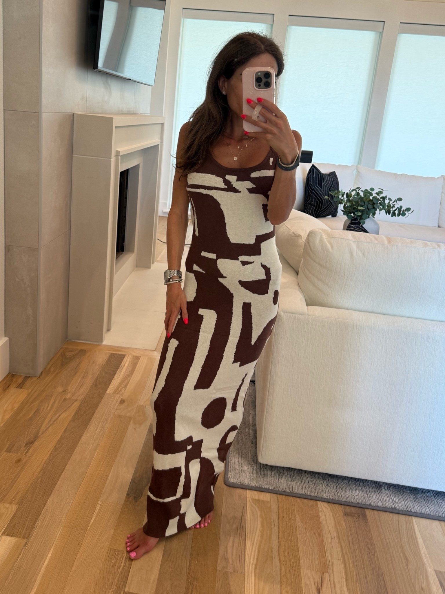 Just got this knit dress for vacation. Love the brown and cream colors wearing smallest size