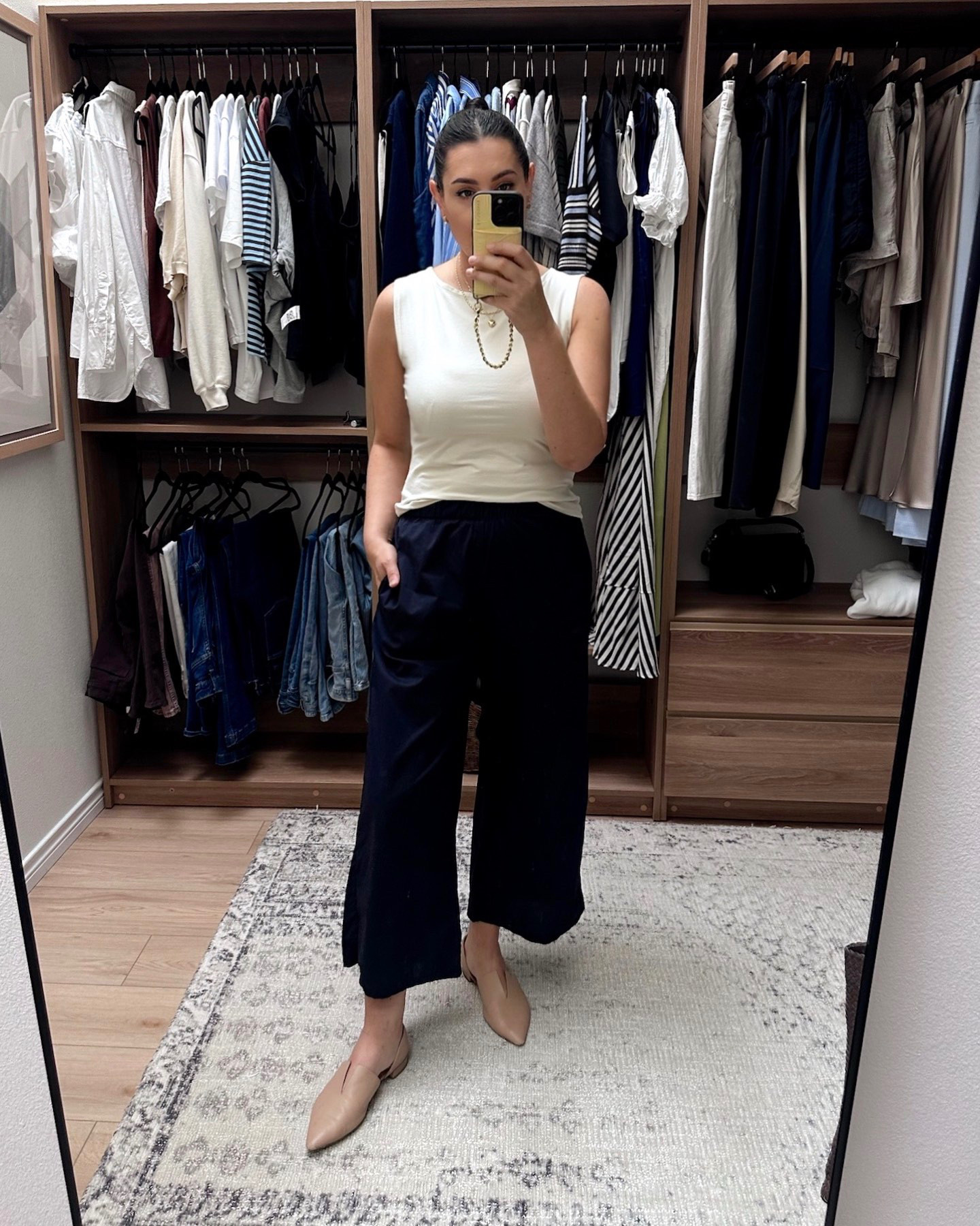 This is a pair of poplin wide leg pants and I love them. I wear them all the time, they’re a really comfortable and airy pair of pants that tned to go with just about anything. I am in the large, they run TTS, so these are just a touch loose at the waist for me. I paired it with this cotton jersey tank which I love. It’s under $20 and has a touch of stretch, but overall is a nice smooth jersey material. I’m in the large. 

 